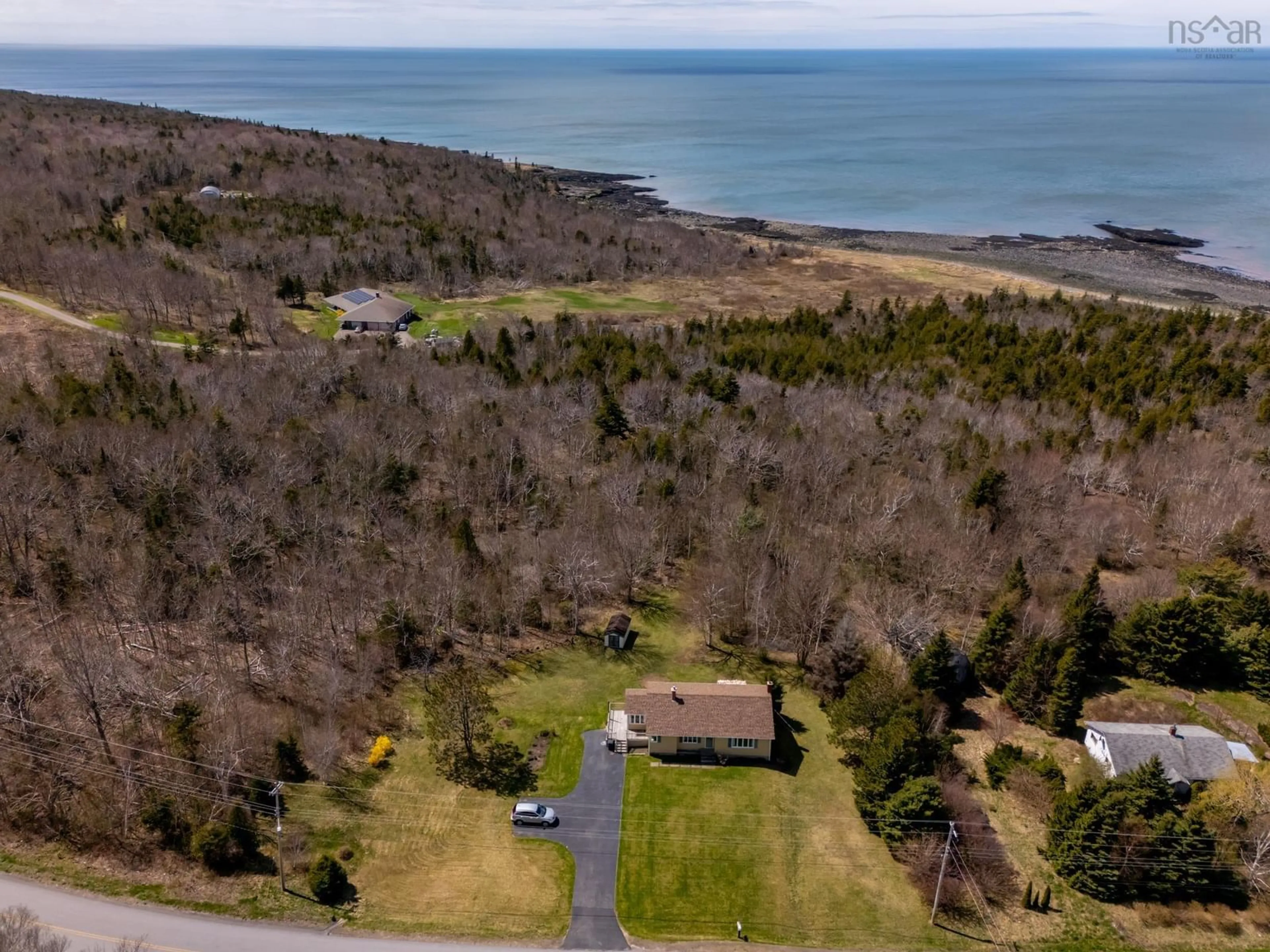 A pic from outside/outdoor area/front of a property/back of a property/a pic from drone, water/lake/river/ocean view for 4231 Shore Rd, Parkers Cove Nova Scotia B0S 1A0