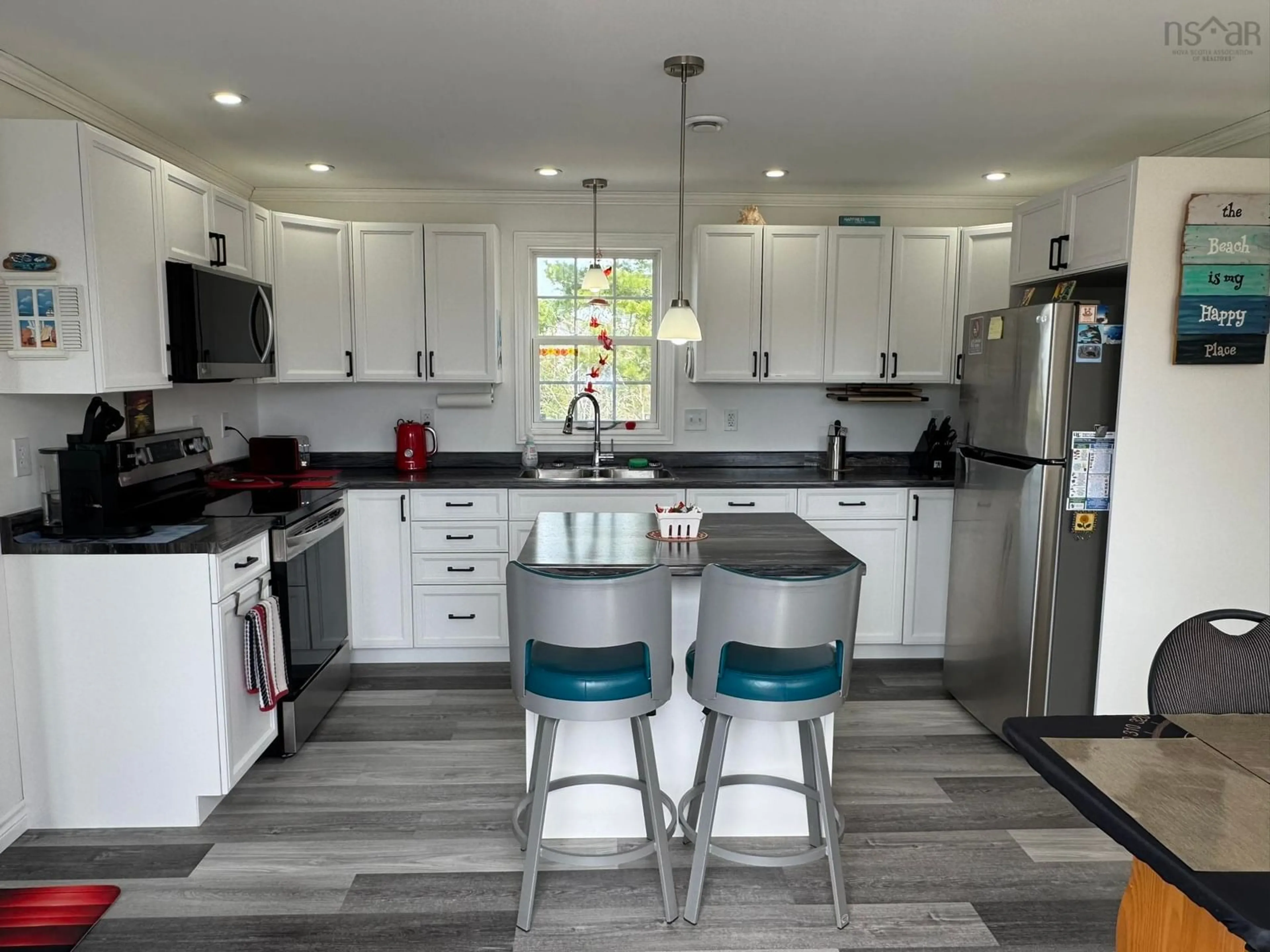 Open concept kitchen, ceramic/tile floor for 7714 Highway 3, Summerville Centre Nova Scotia B0T 1T0