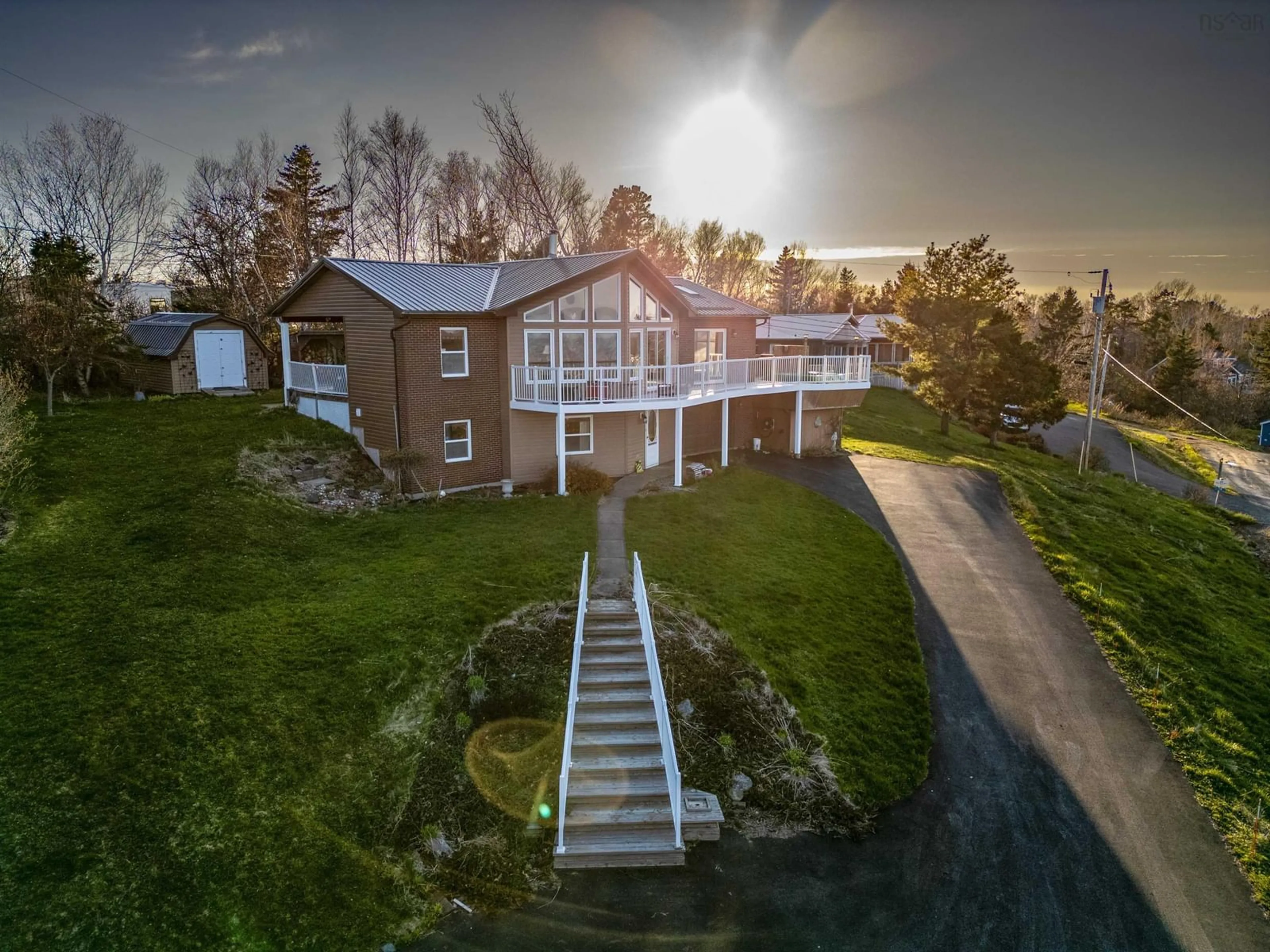 A pic from outside/outdoor area/front of a property/back of a property/a pic from drone, unknown for 39 Blue Heron Dr, Black Point Nova Scotia B0K 1X0