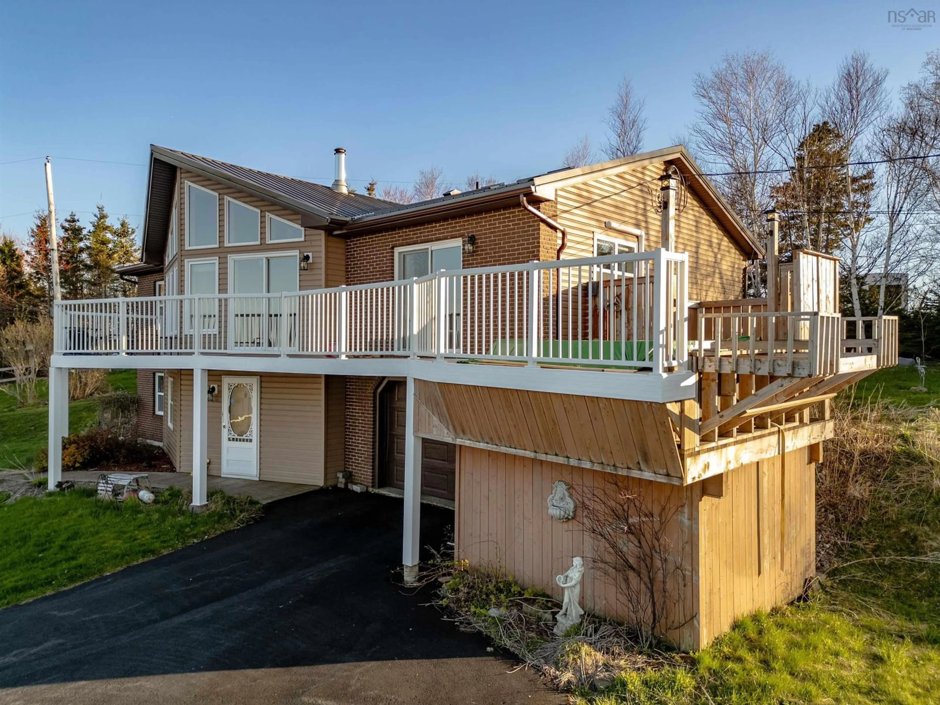A pic from outside/outdoor area/front of a property/back of a property/a pic from drone, unknown for 39 Blue Heron Dr, Black Point Nova Scotia B0K 1X0