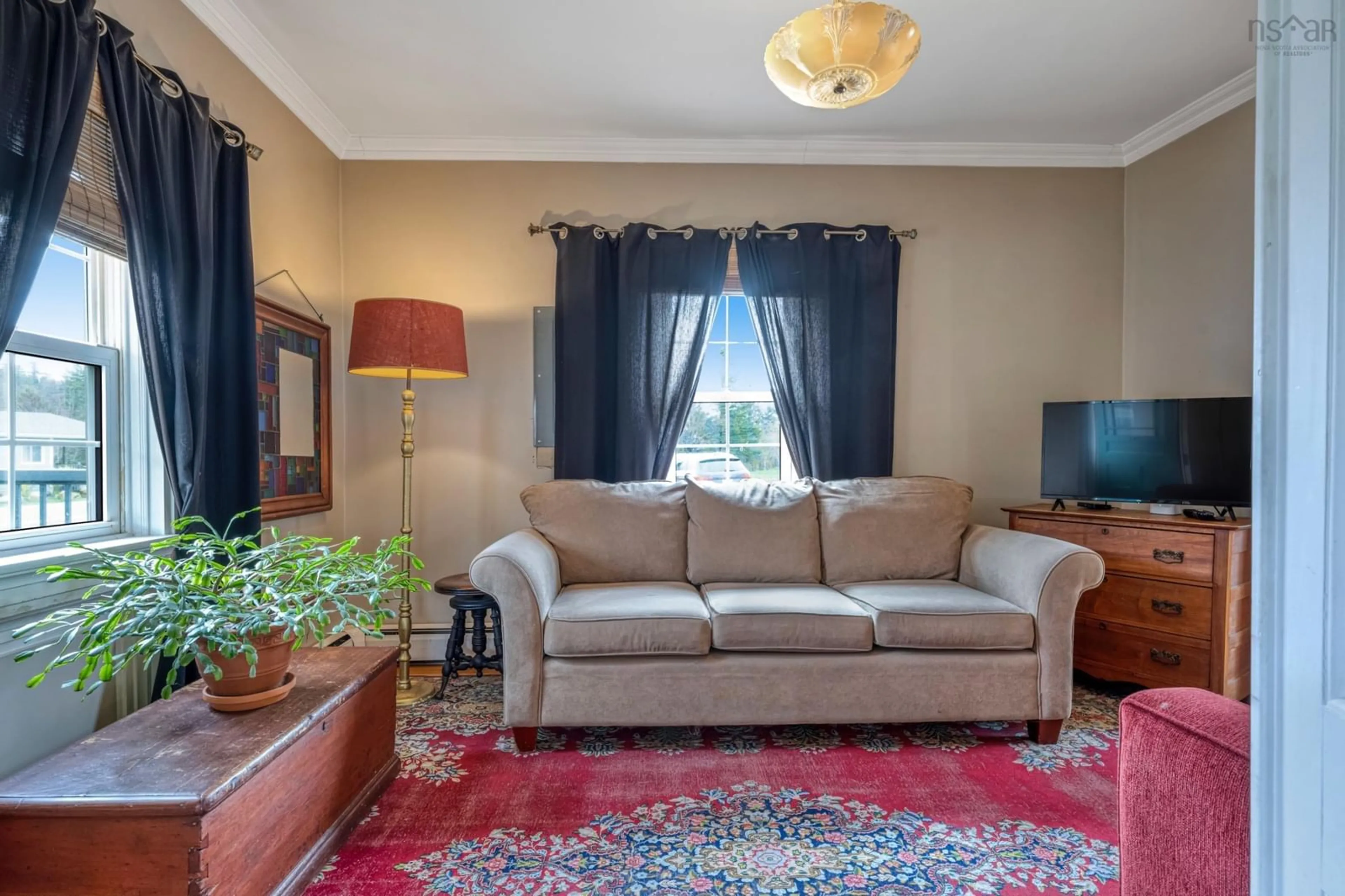 Living room with furniture, carpet floor for 39 Petite Riviere Rd, Petite Rivière Nova Scotia B4V 5Z2