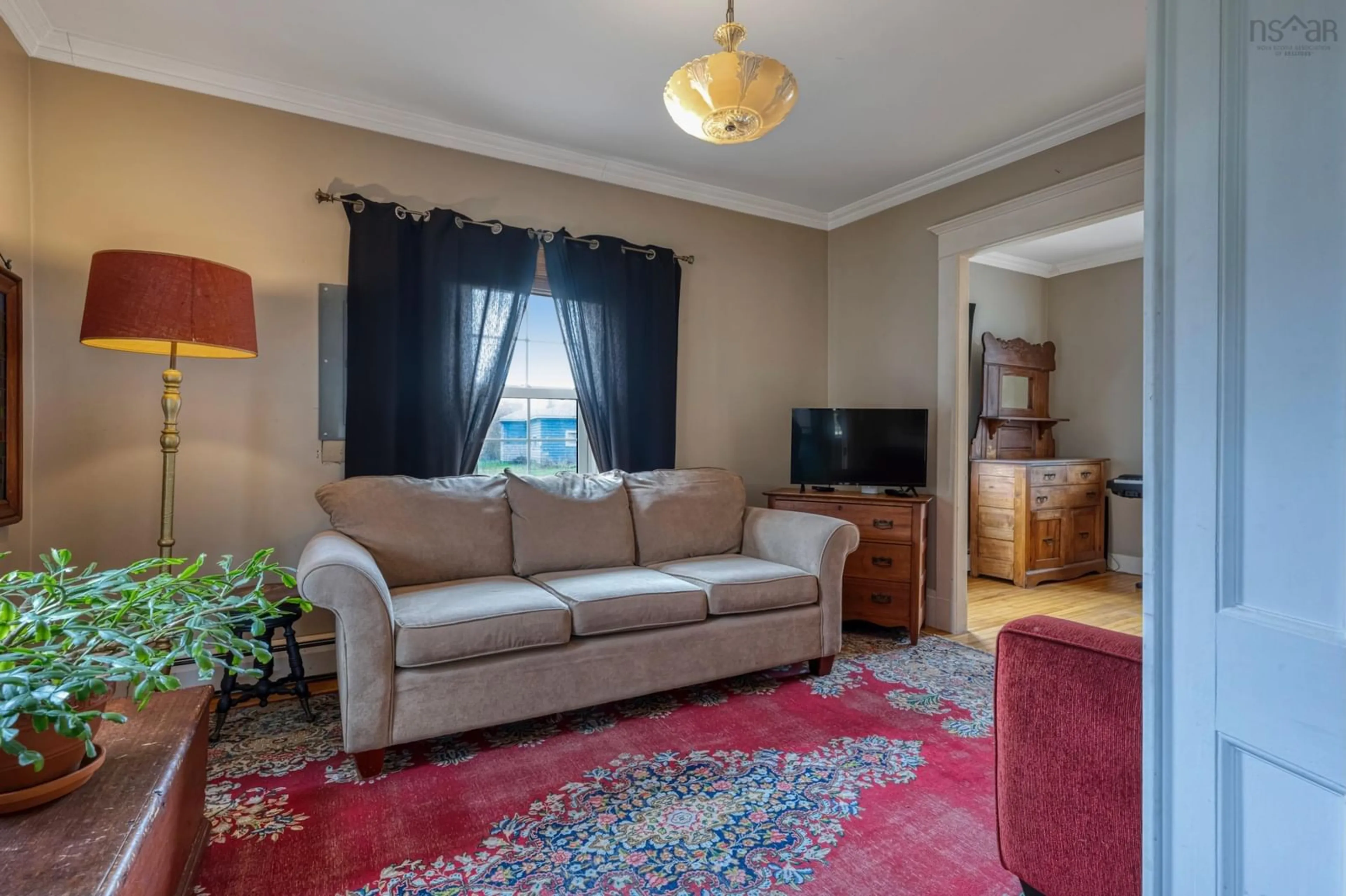 Living room with furniture, carpet floor for 39 Petite Riviere Rd, Petite Rivière Nova Scotia B4V 5Z2
