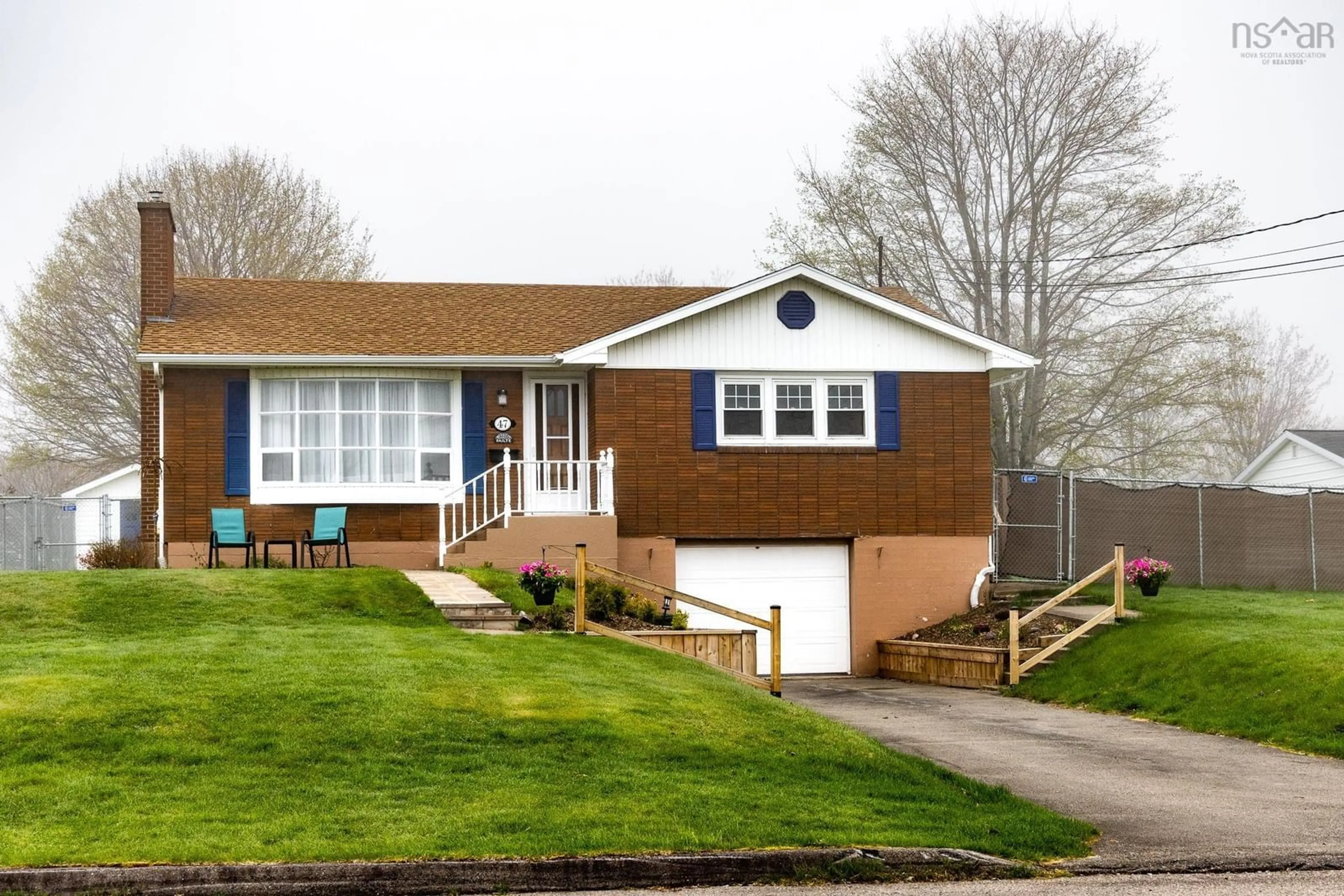 Home with vinyl exterior material, street for 47 Hebrides Dr, Westmount Nova Scotia B1R 2A3