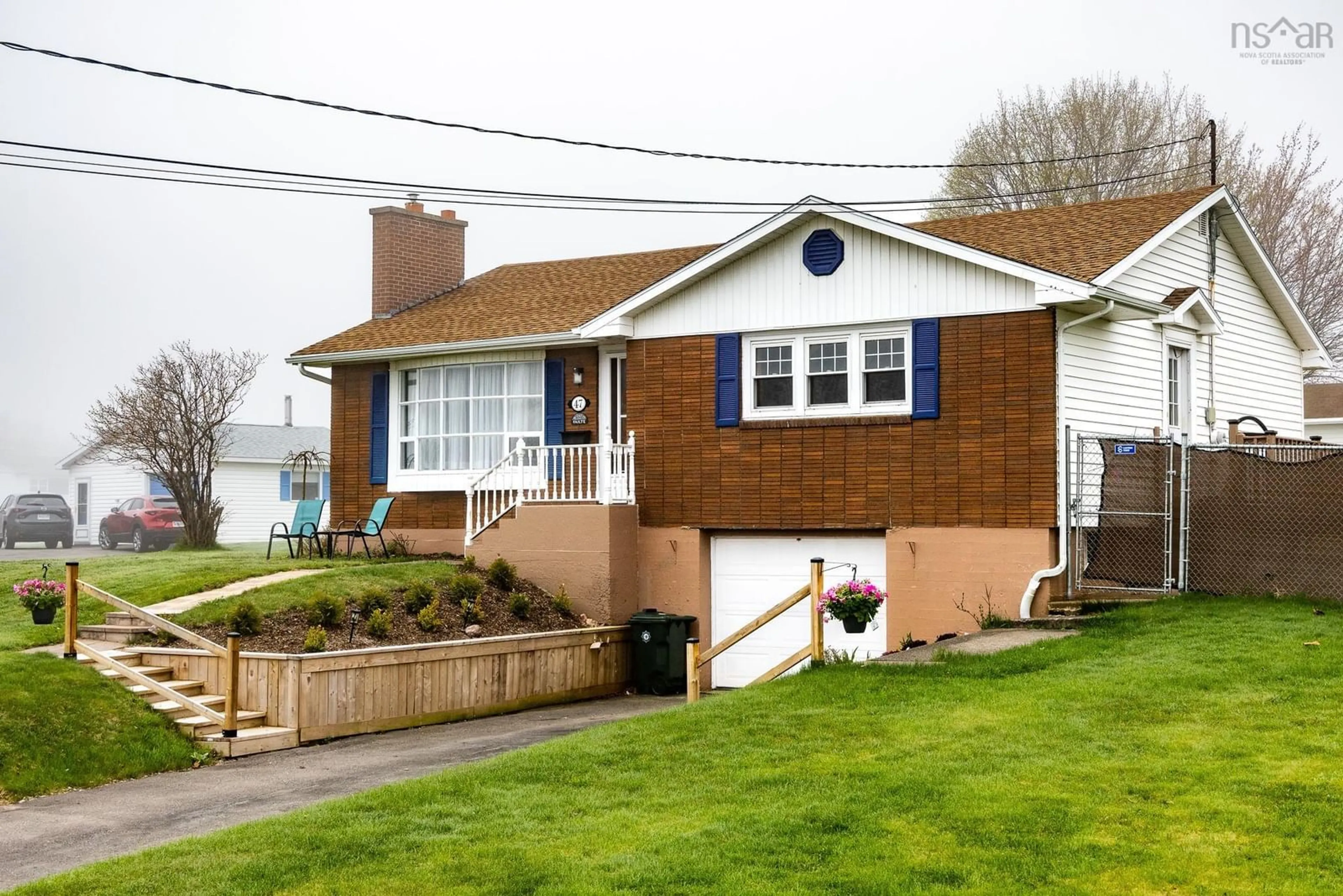 Home with vinyl exterior material, street for 47 Hebrides Dr, Westmount Nova Scotia B1R 2A3