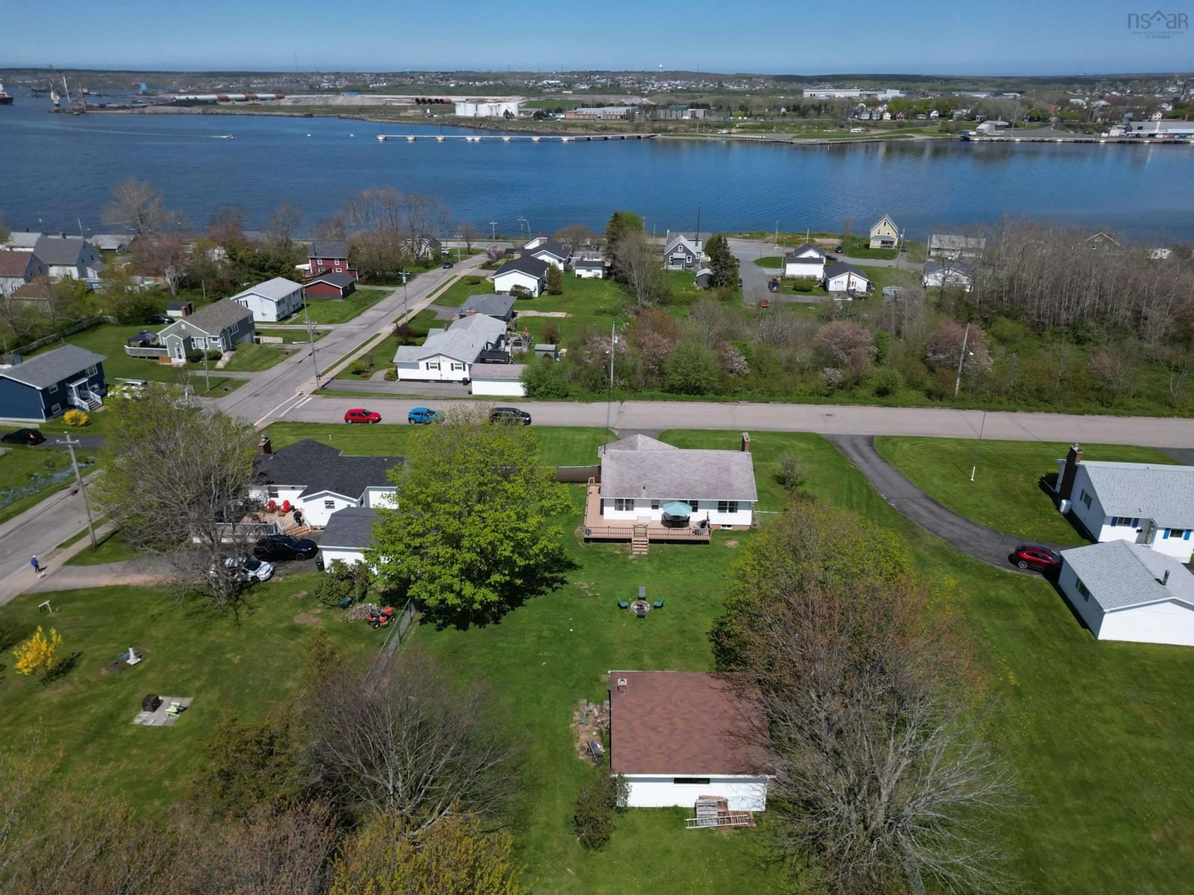 A pic from outside/outdoor area/front of a property/back of a property/a pic from drone, water/lake/river/ocean view for 47 Hebrides Dr, Westmount Nova Scotia B1R 2A3