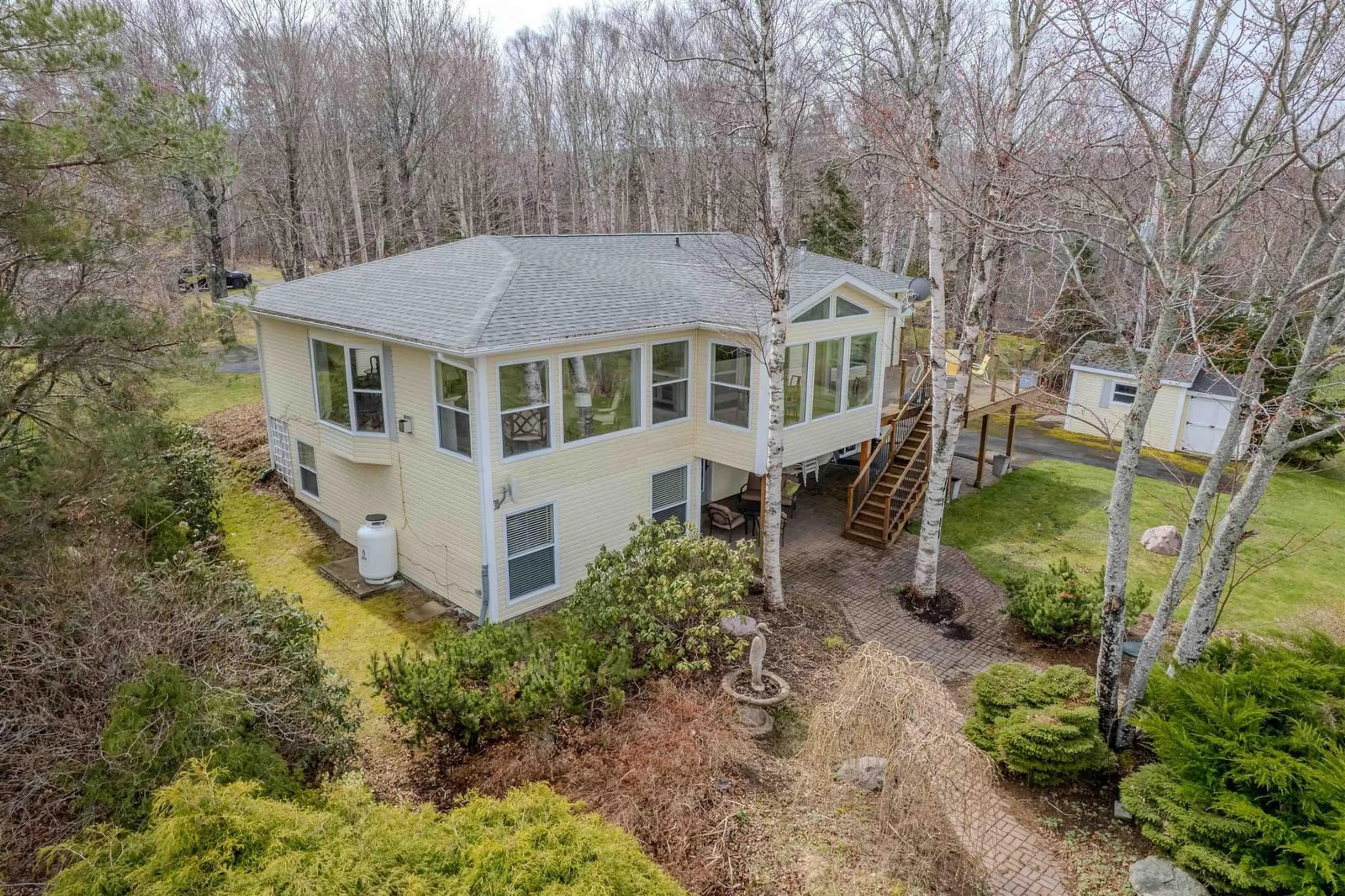 A pic from outside/outdoor area/front of a property/back of a property/a pic from drone, water/lake/river/ocean view for 86 Tweednooge Pl, East Bay Nova Scotia B1J 1M6