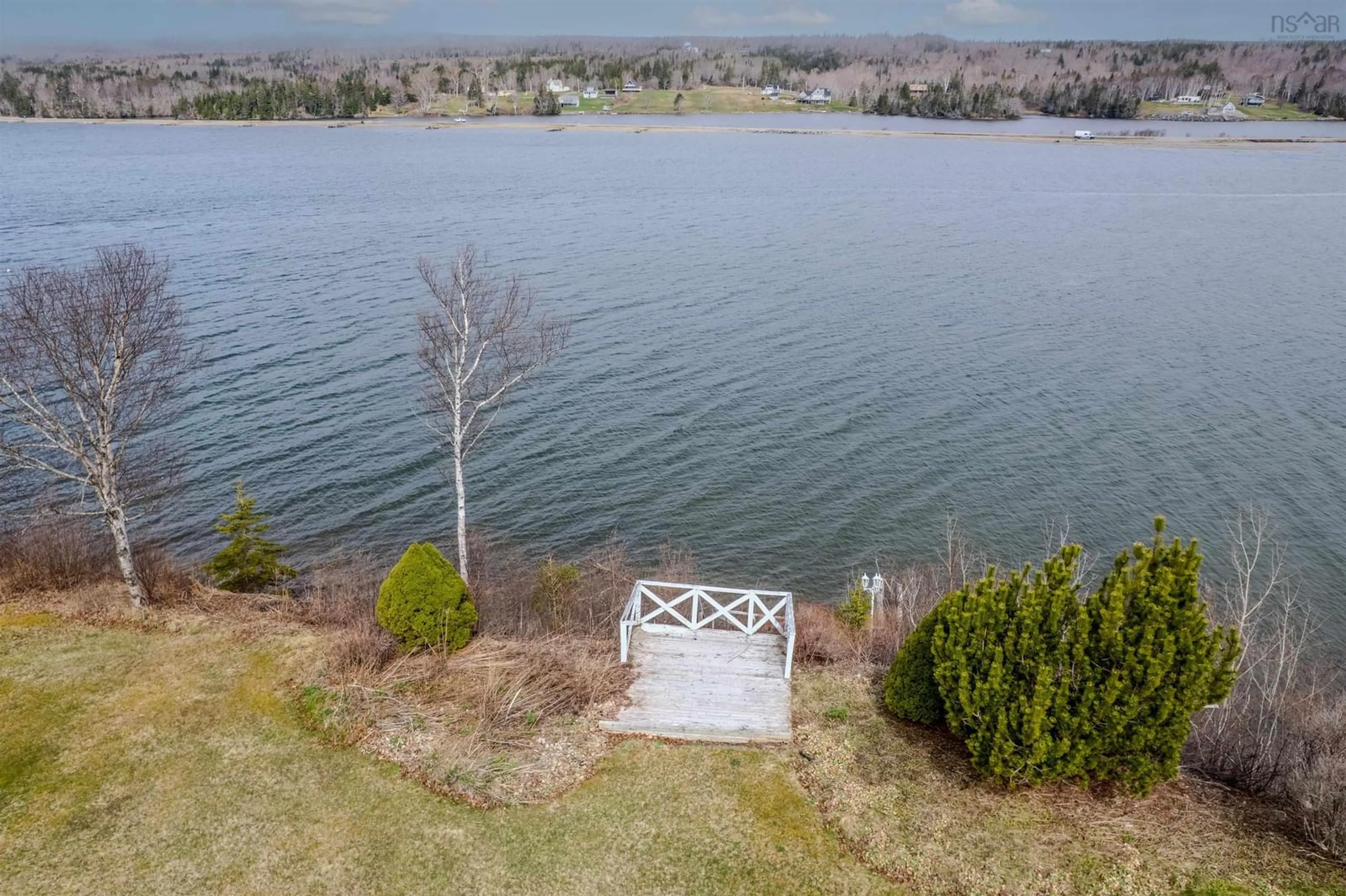 A pic from outside/outdoor area/front of a property/back of a property/a pic from drone, water/lake/river/ocean view for 86 Tweednooge Pl, East Bay Nova Scotia B1J 1M6