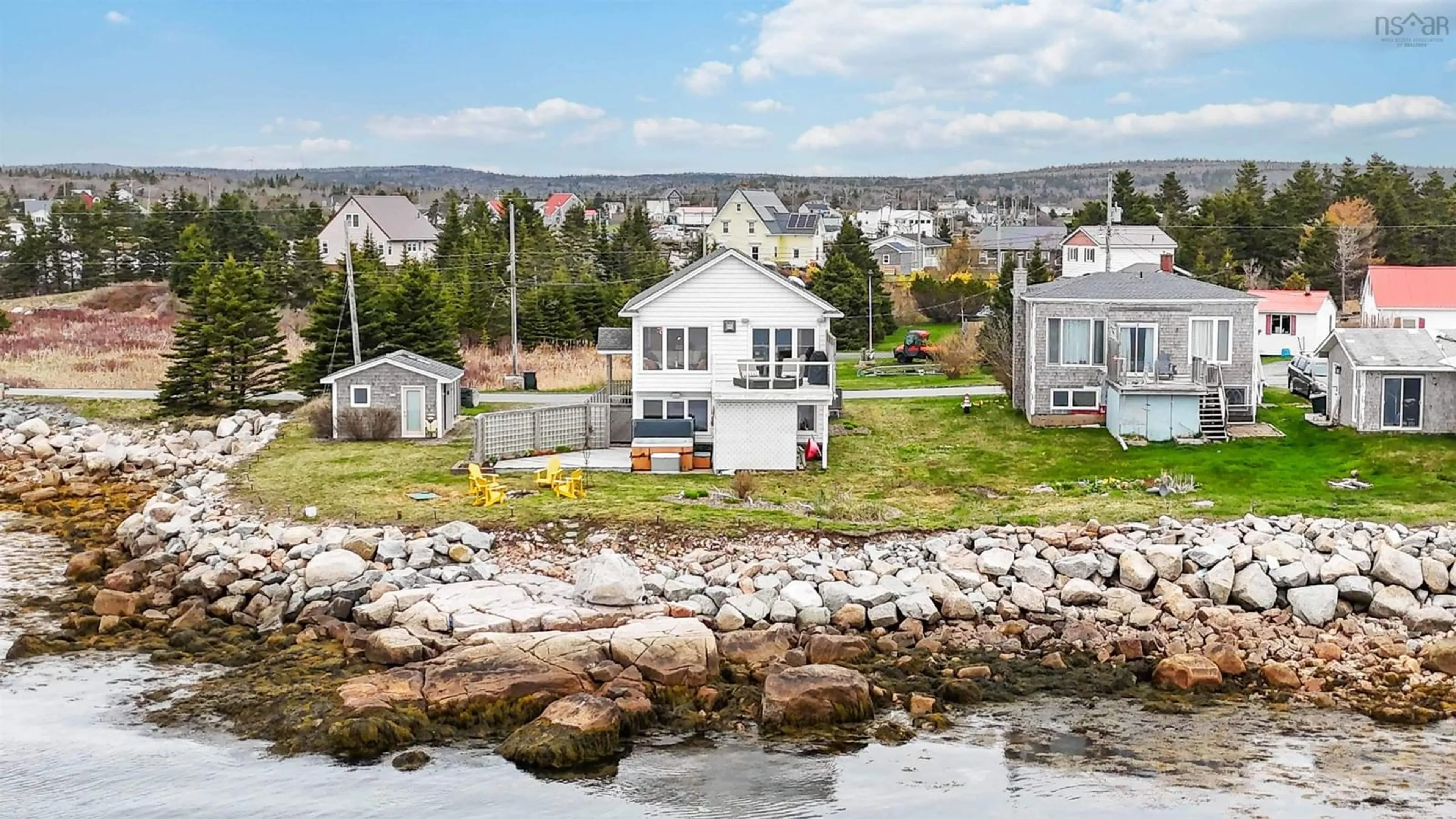 A pic from outside/outdoor area/front of a property/back of a property/a pic from drone, water/lake/river/ocean view for 39 Bull Point Rd, Sambro Nova Scotia B3V 1R3