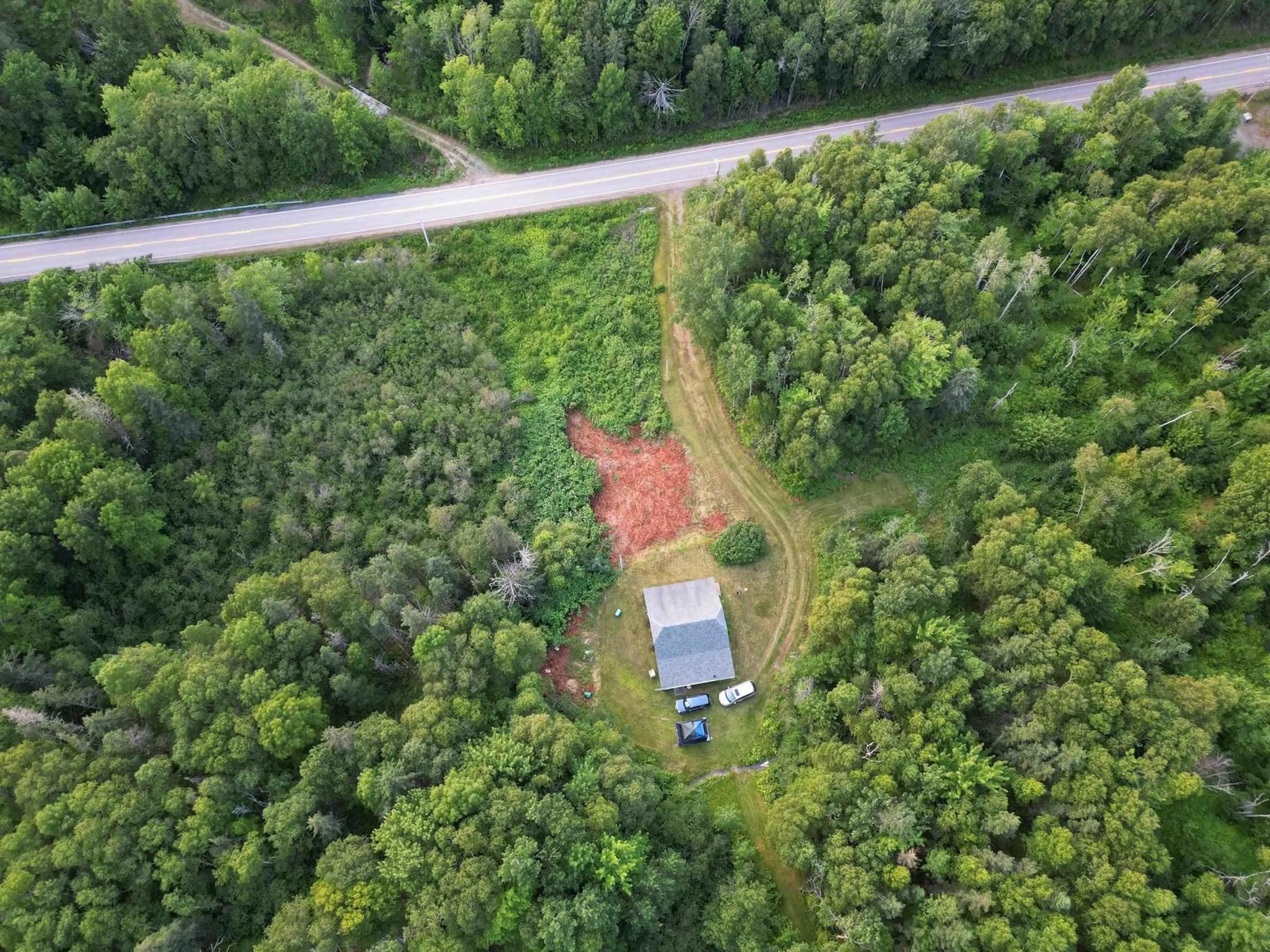 A pic from outside/outdoor area/front of a property/back of a property/a pic from drone, forest/trees view for 7319 223 Hwy, Big Beach Nova Scotia B1T 1M2