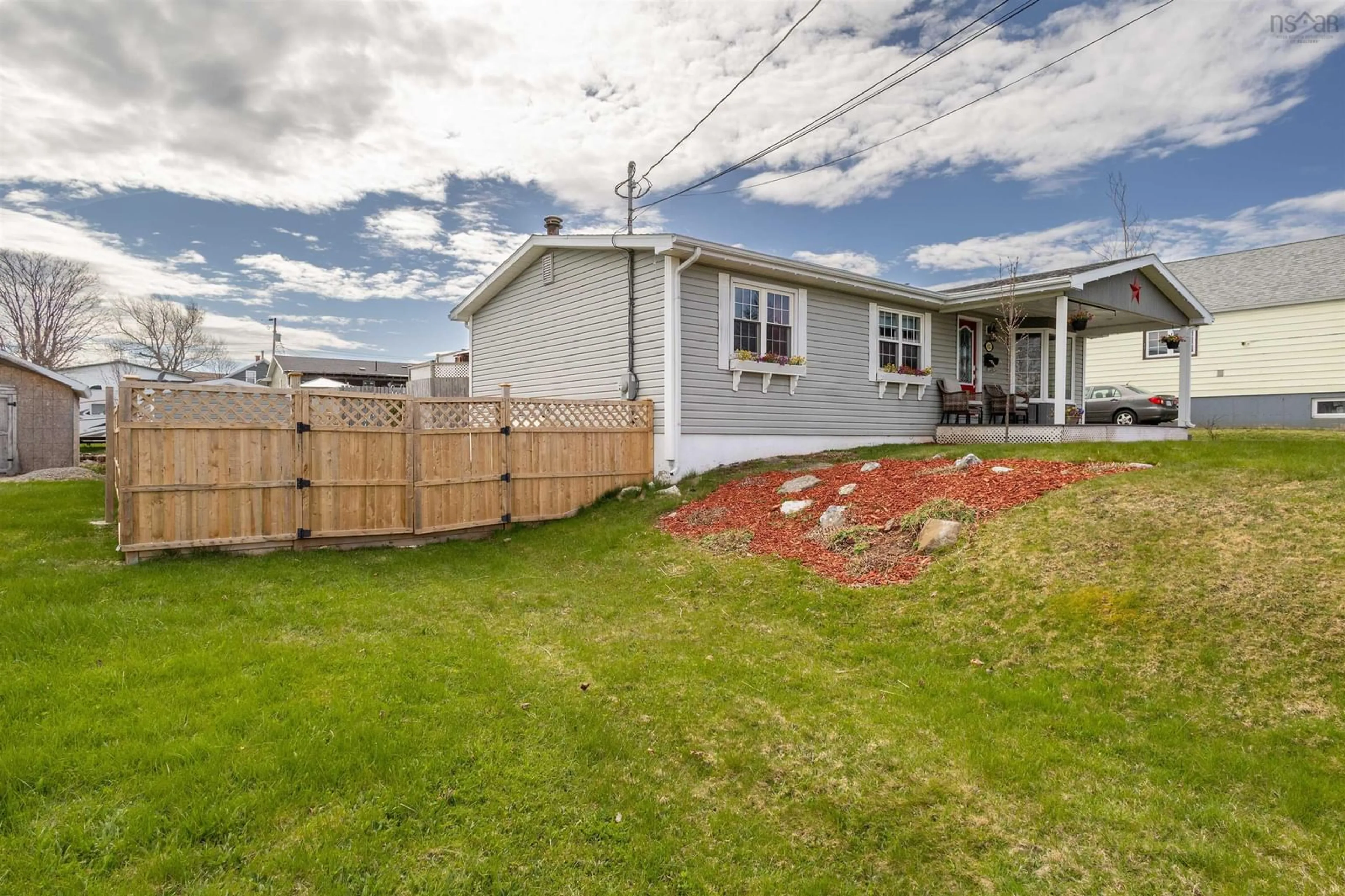 A pic from outside/outdoor area/front of a property/back of a property/a pic from drone, unknown for 652 Thompson St, New Waterford Nova Scotia B1H 4C6