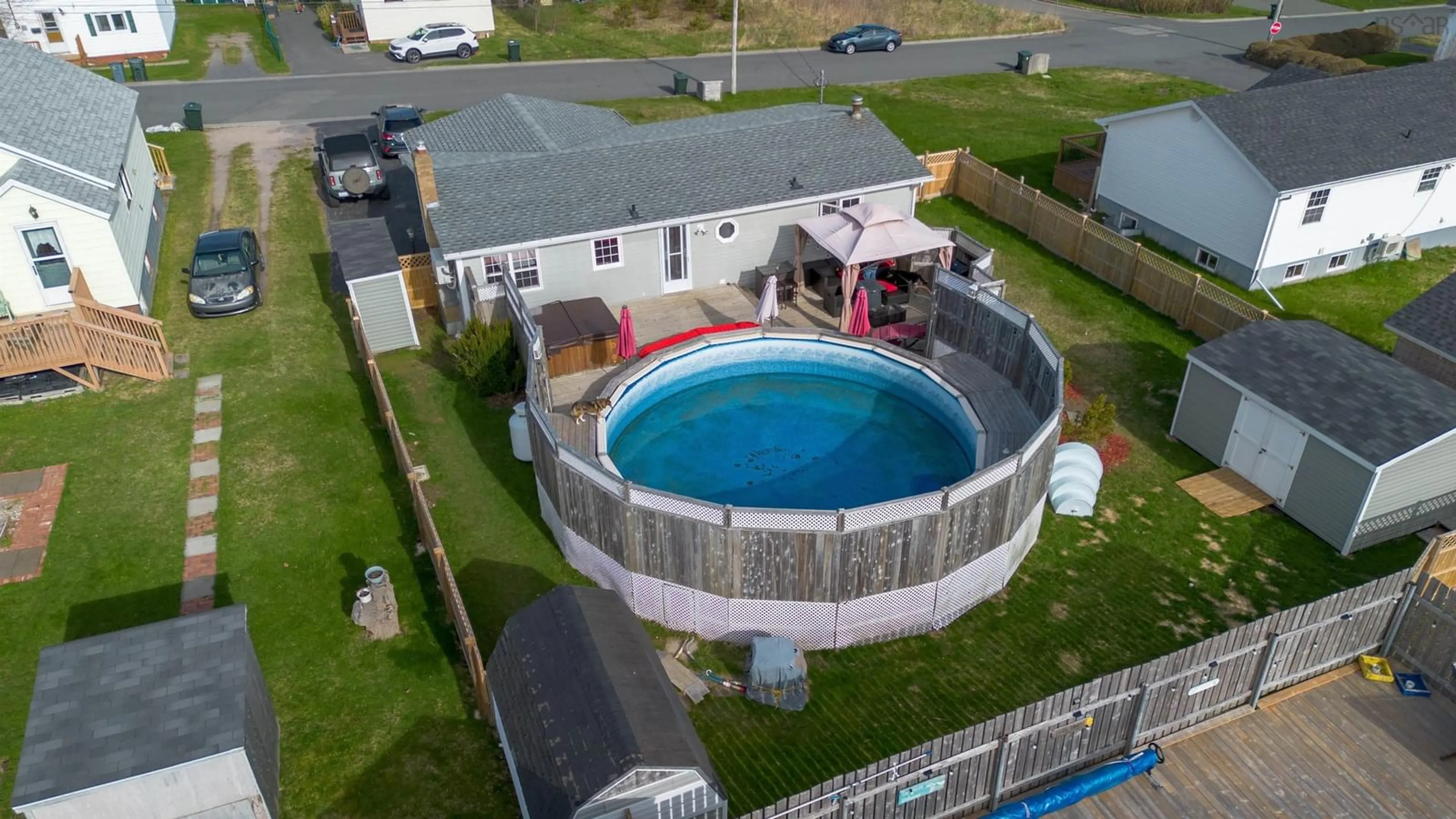 A pic from outside/outdoor area/front of a property/back of a property/a pic from drone, water/lake/river/ocean view for 652 Thompson St, New Waterford Nova Scotia B1H 4C6