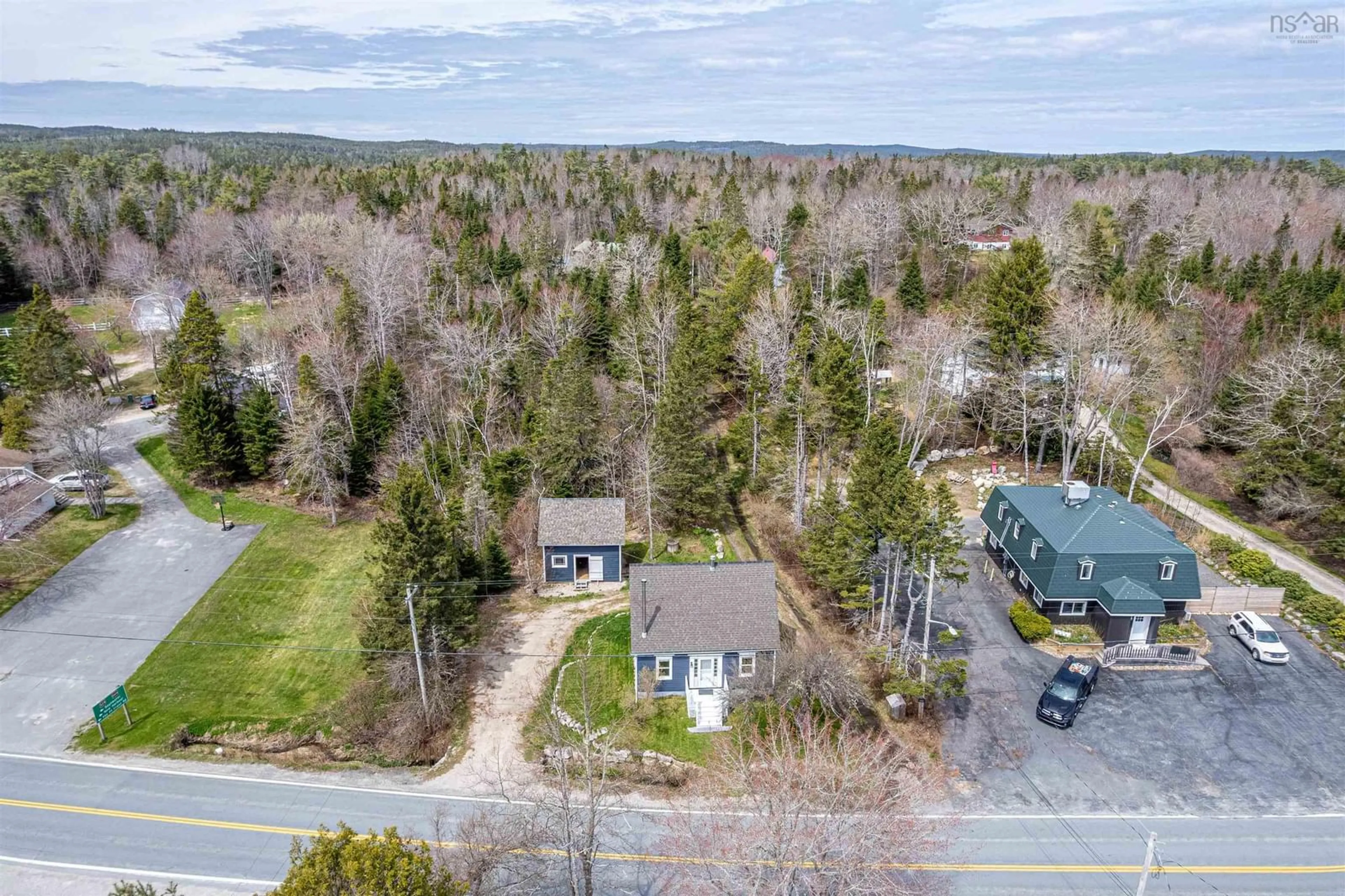 A pic from outside/outdoor area/front of a property/back of a property/a pic from drone, forest/trees view for 10423 St. Margarets Bay Rd, Hubbards Nova Scotia B0J 1T0