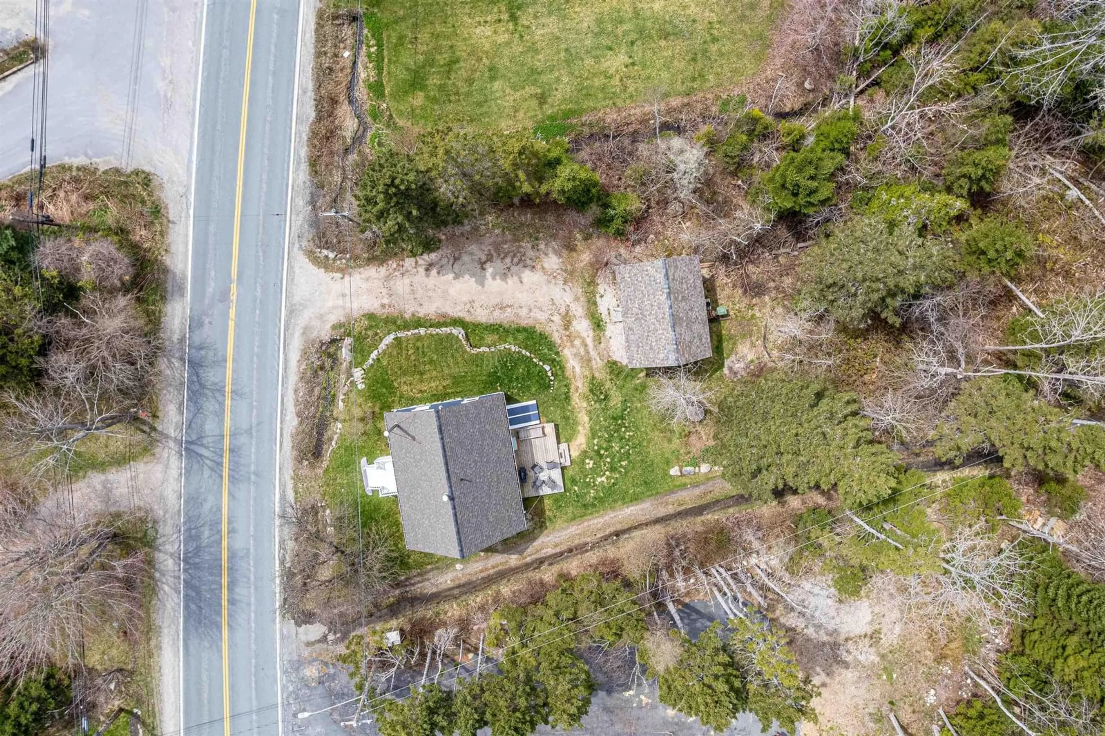 A pic from outside/outdoor area/front of a property/back of a property/a pic from drone, street for 10423 St. Margarets Bay Rd, Hubbards Nova Scotia B0J 1T0