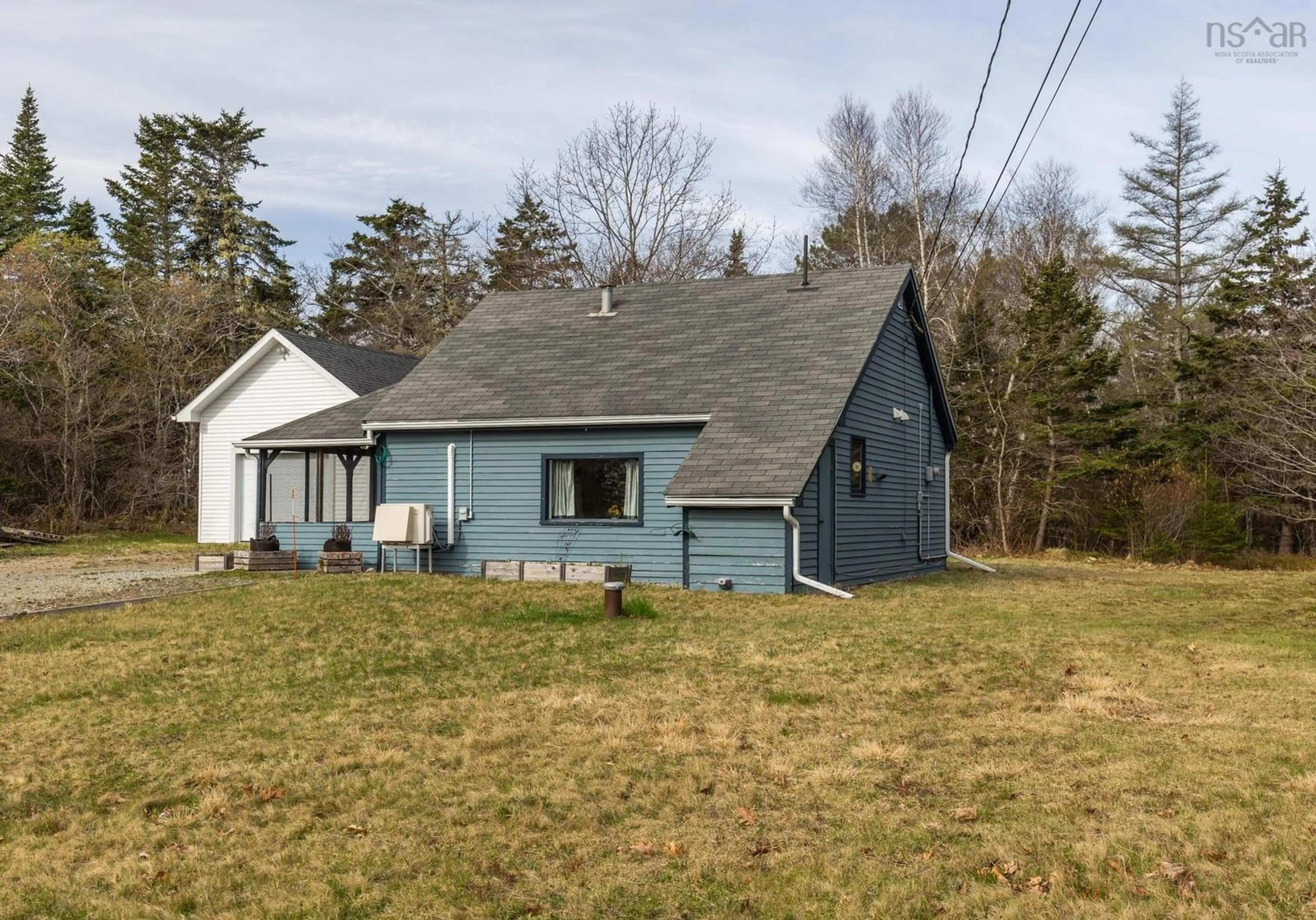 A pic from outside/outdoor area/front of a property/back of a property/a pic from drone, street for 436 Rocco Point Rd, Rocco Point Nova Scotia B0W 2X0