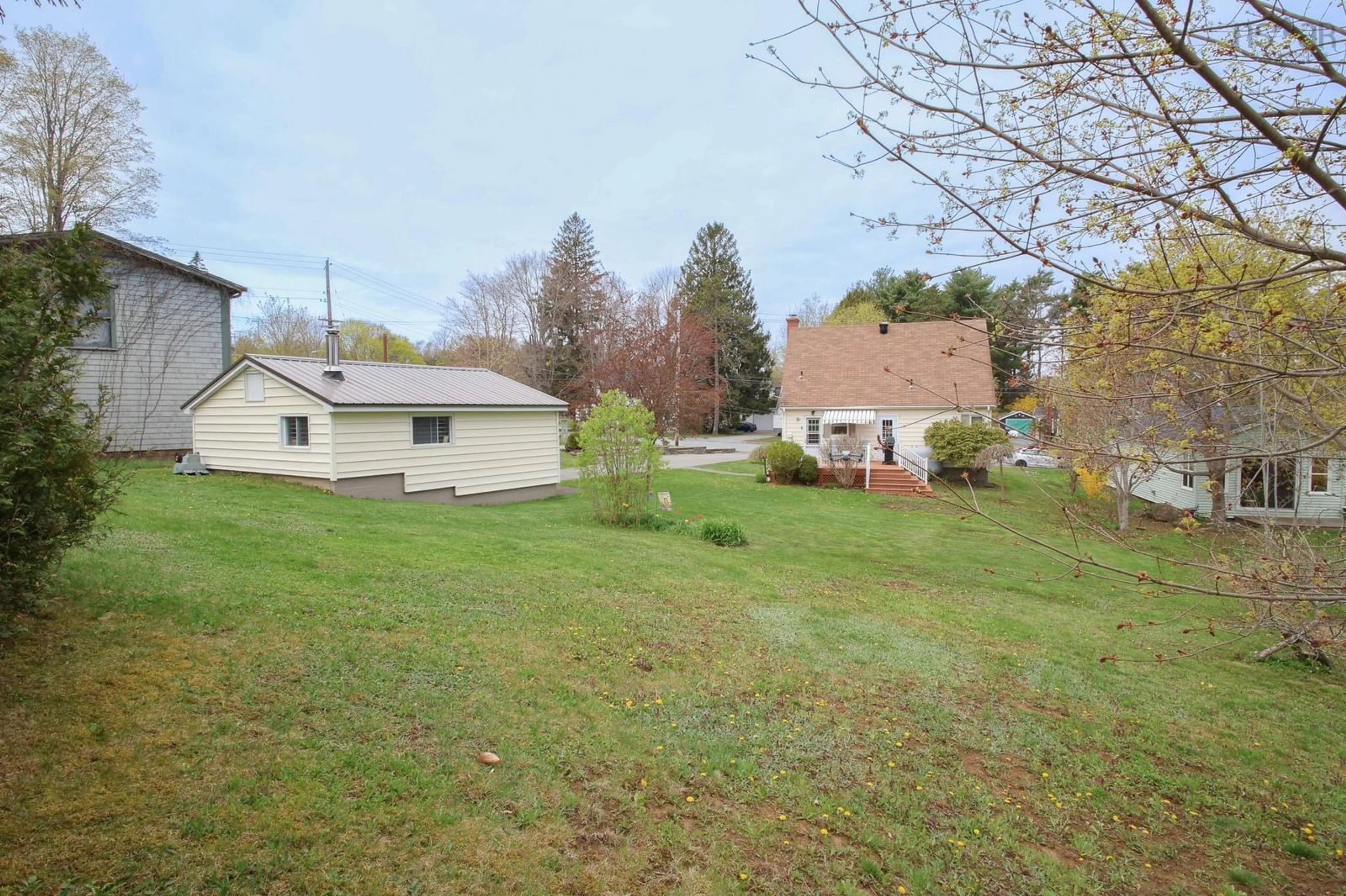 A pic from outside/outdoor area/front of a property/back of a property/a pic from drone, unknown for 221 Empire St, Bridgewater Nova Scotia B4V 2M4