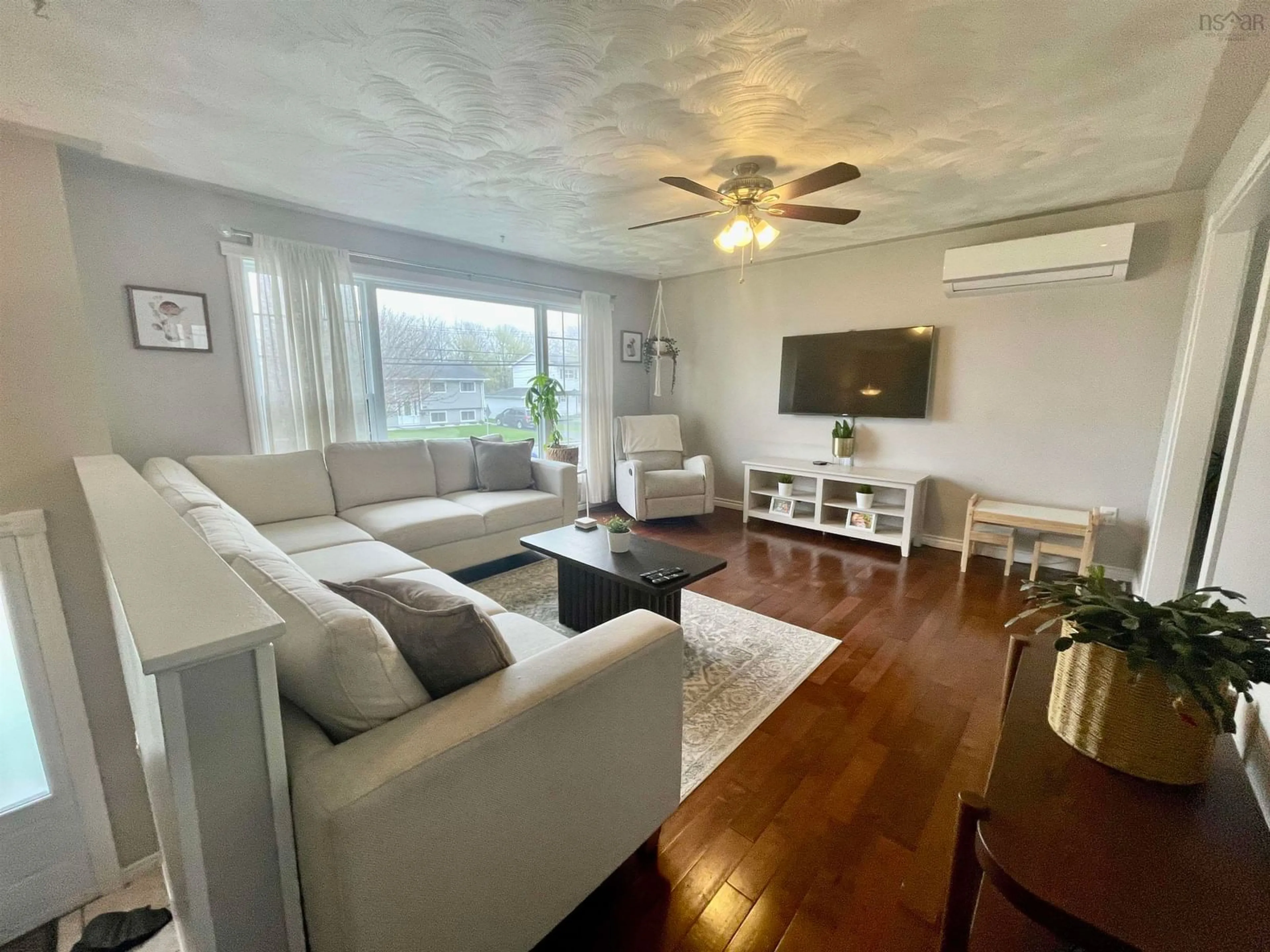 Living room with furniture, wood/laminate floor for 114 Poplar Dr, Cole Harbour Nova Scotia B2W 2K6