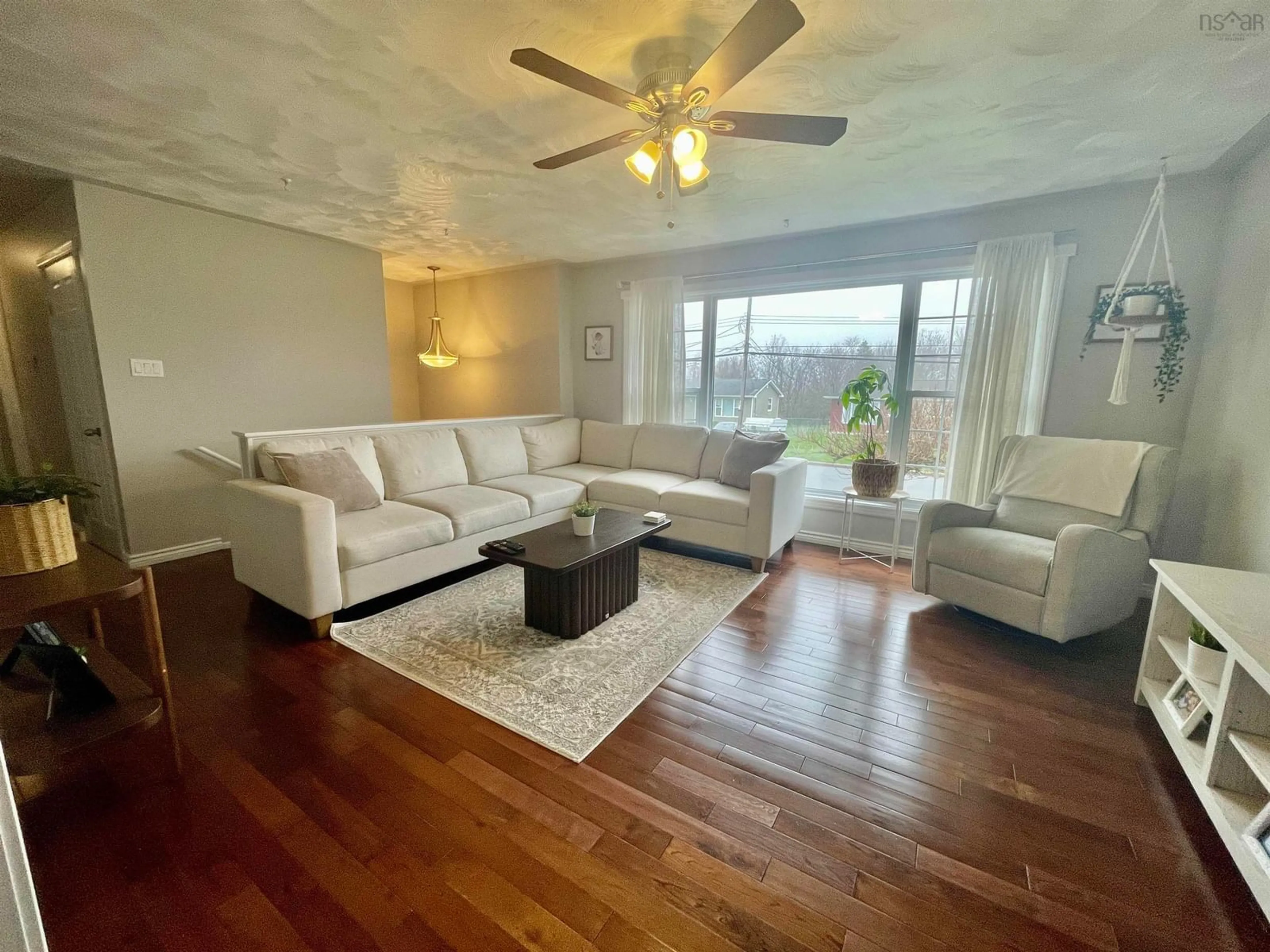 Living room with furniture, wood/laminate floor for 114 Poplar Dr, Cole Harbour Nova Scotia B2W 2K6