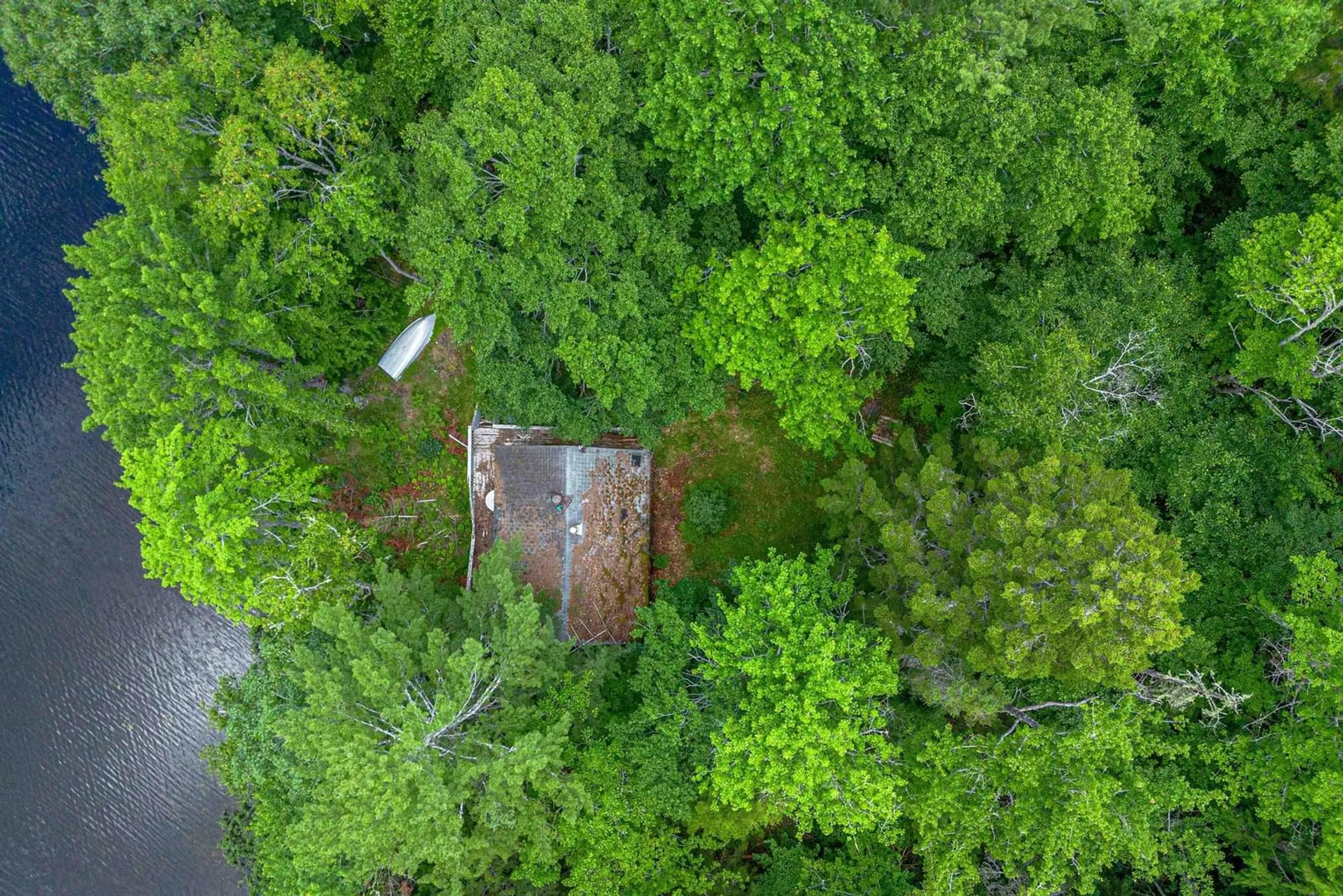 A pic from outside/outdoor area/front of a property/back of a property/a pic from drone, forest/trees view for 50 Hide Away Lane, Crossburn Nova Scotia B0P 1C0