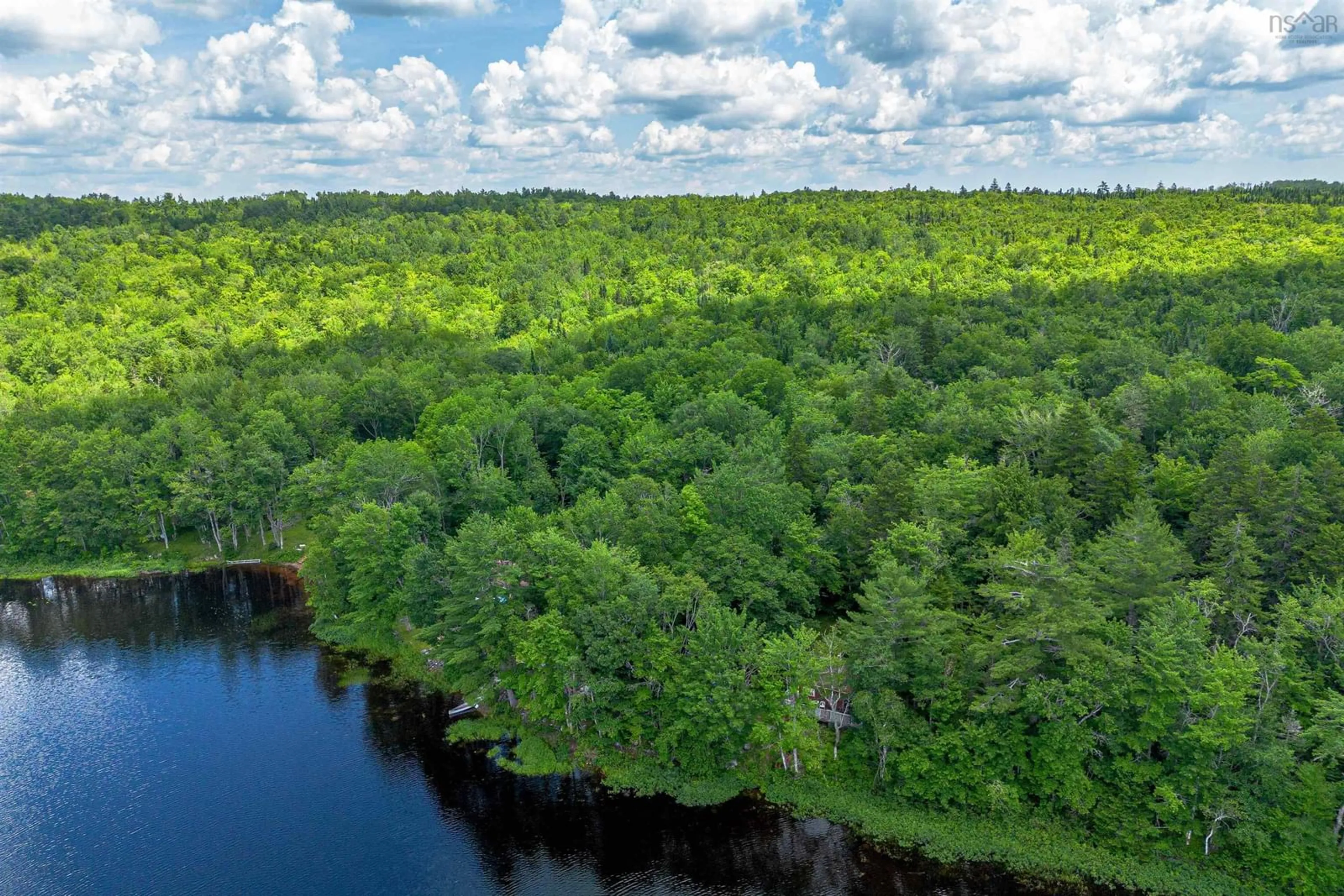 A pic from outside/outdoor area/front of a property/back of a property/a pic from drone, water/lake/river/ocean view for 50 Hide Away Lane, Crossburn Nova Scotia B0P 1C0