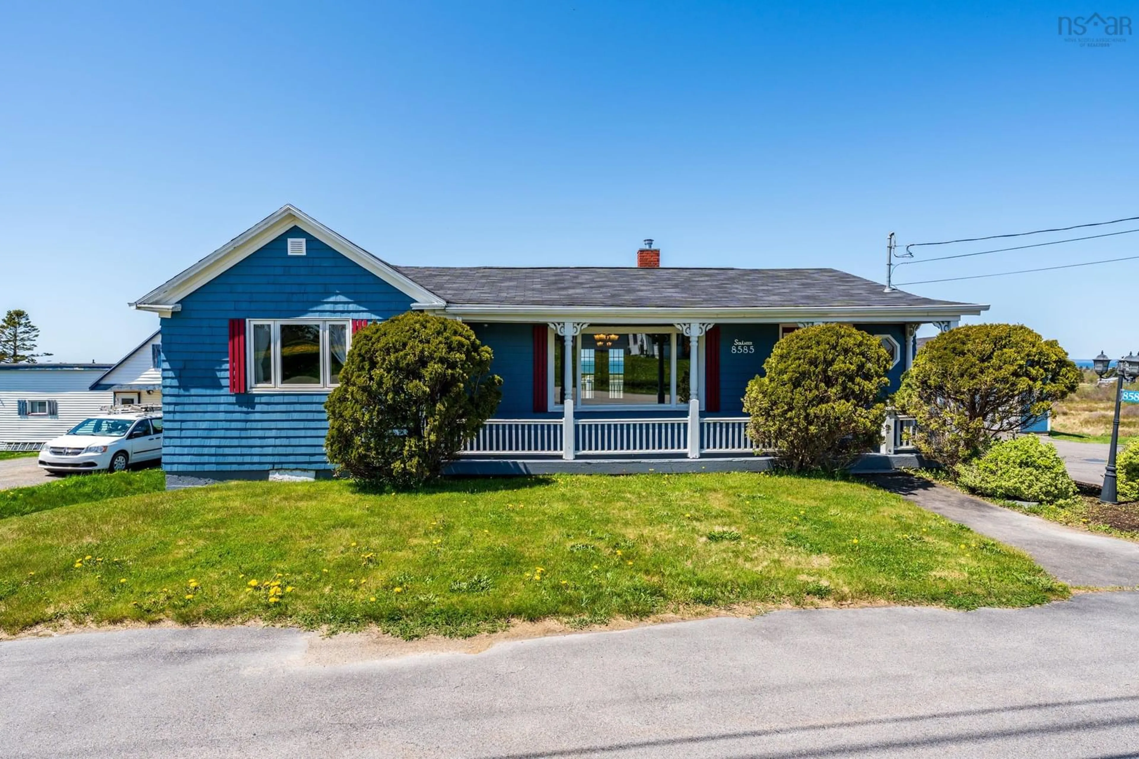 Home with vinyl exterior material, street for 8585 Highway 1, Meteghan Centre Nova Scotia B0W 2K0
