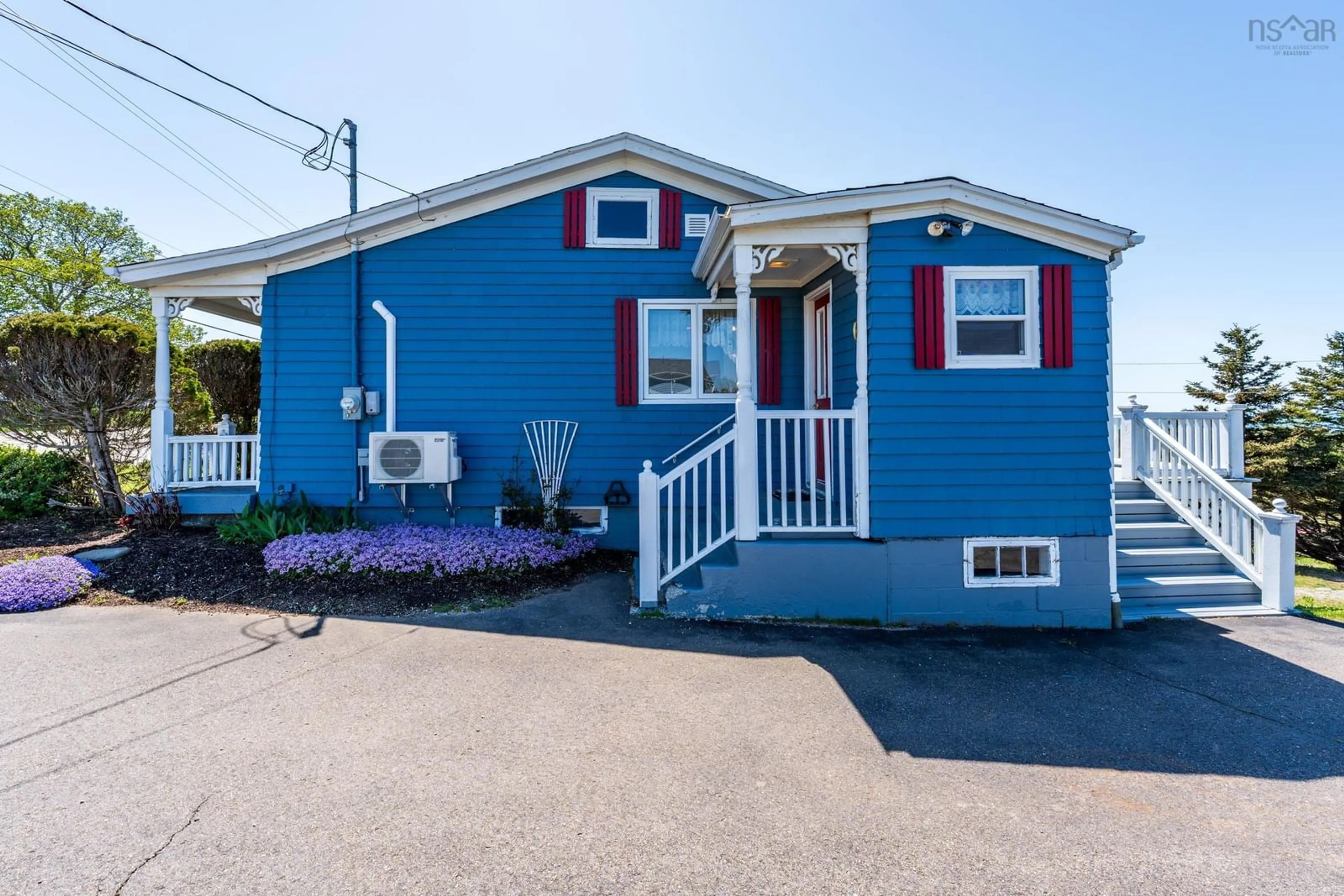 Home with vinyl exterior material, street for 8585 Highway 1, Meteghan Centre Nova Scotia B0W 2K0