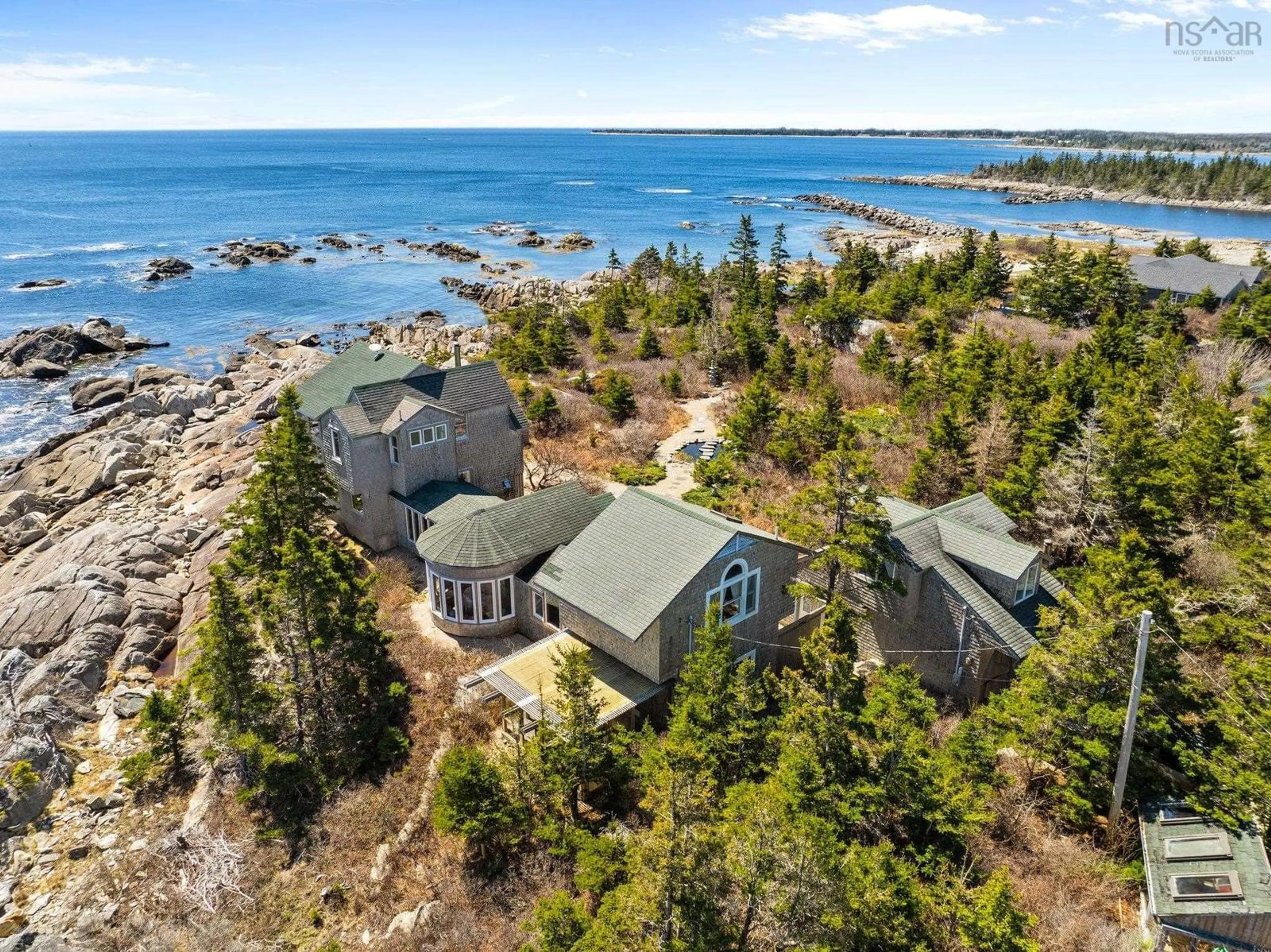A pic from outside/outdoor area/front of a property/back of a property/a pic from drone, water/lake/river/ocean view for 1017 Long Cove Rd, Port Medway Nova Scotia B0J 2T0