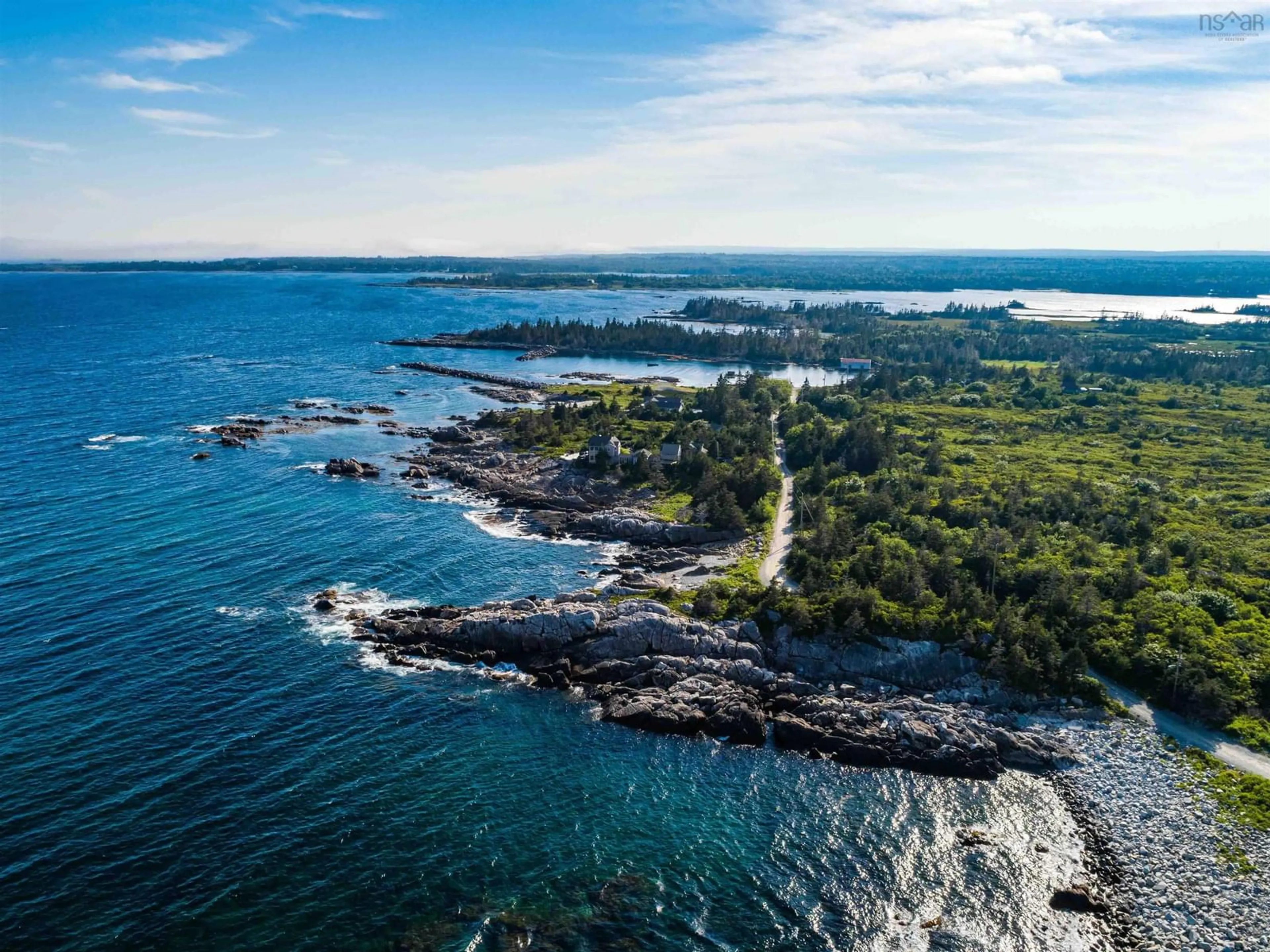 A pic from outside/outdoor area/front of a property/back of a property/a pic from drone, water/lake/river/ocean view for 1017 Long Cove Rd, Port Medway Nova Scotia B0J 2T0
