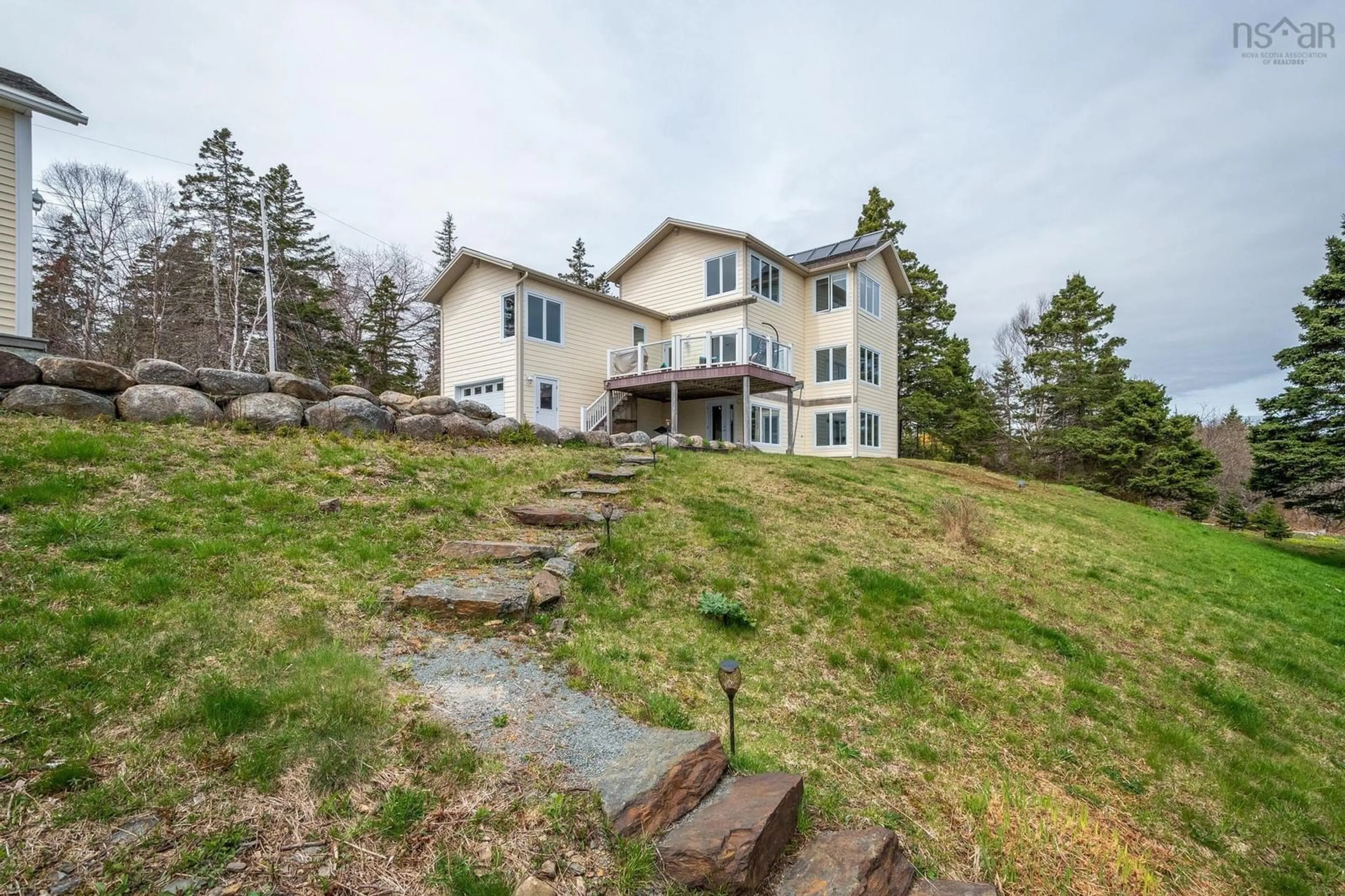 A pic from outside/outdoor area/front of a property/back of a property/a pic from drone, water/lake/river/ocean view for 82 Bells Cove Exten, Dublin Shore Nova Scotia B0R 1C0