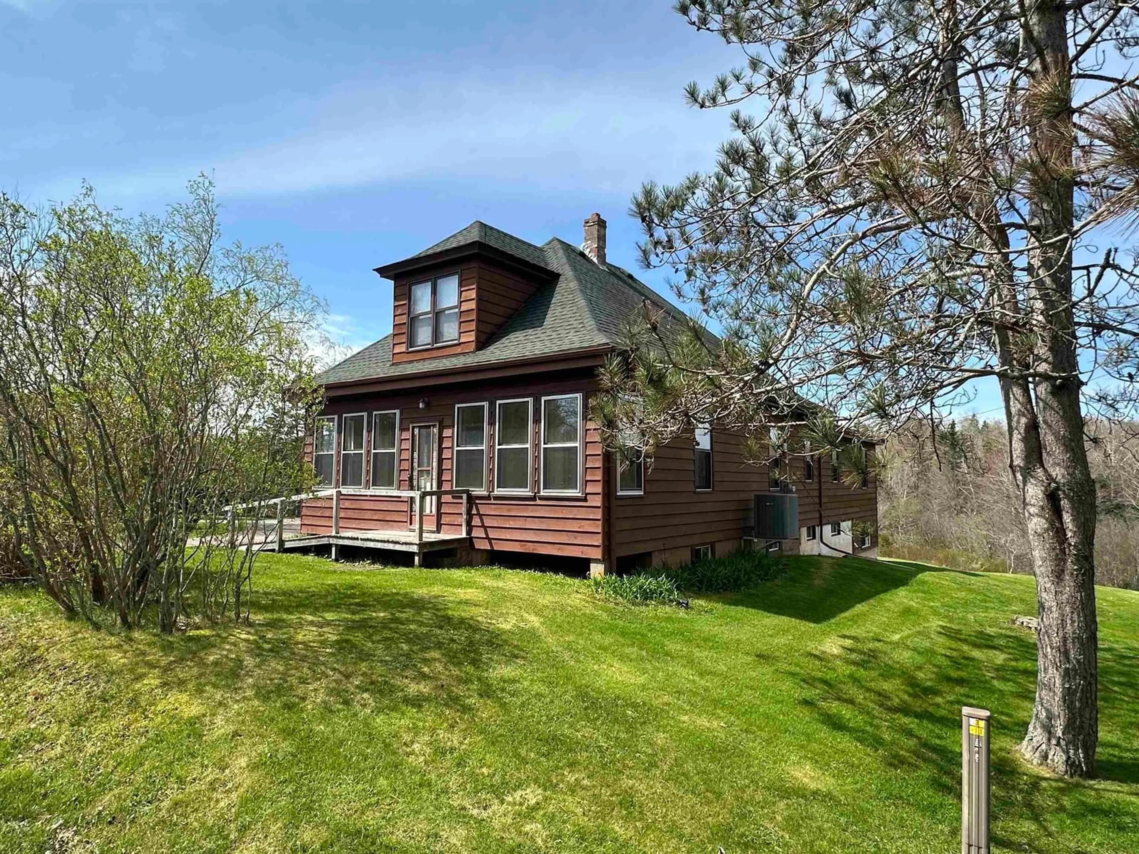 A pic from outside/outdoor area/front of a property/back of a property/a pic from drone, water/lake/river/ocean view for 11494 Highway 215, Urbania Nova Scotia B0N 2H0