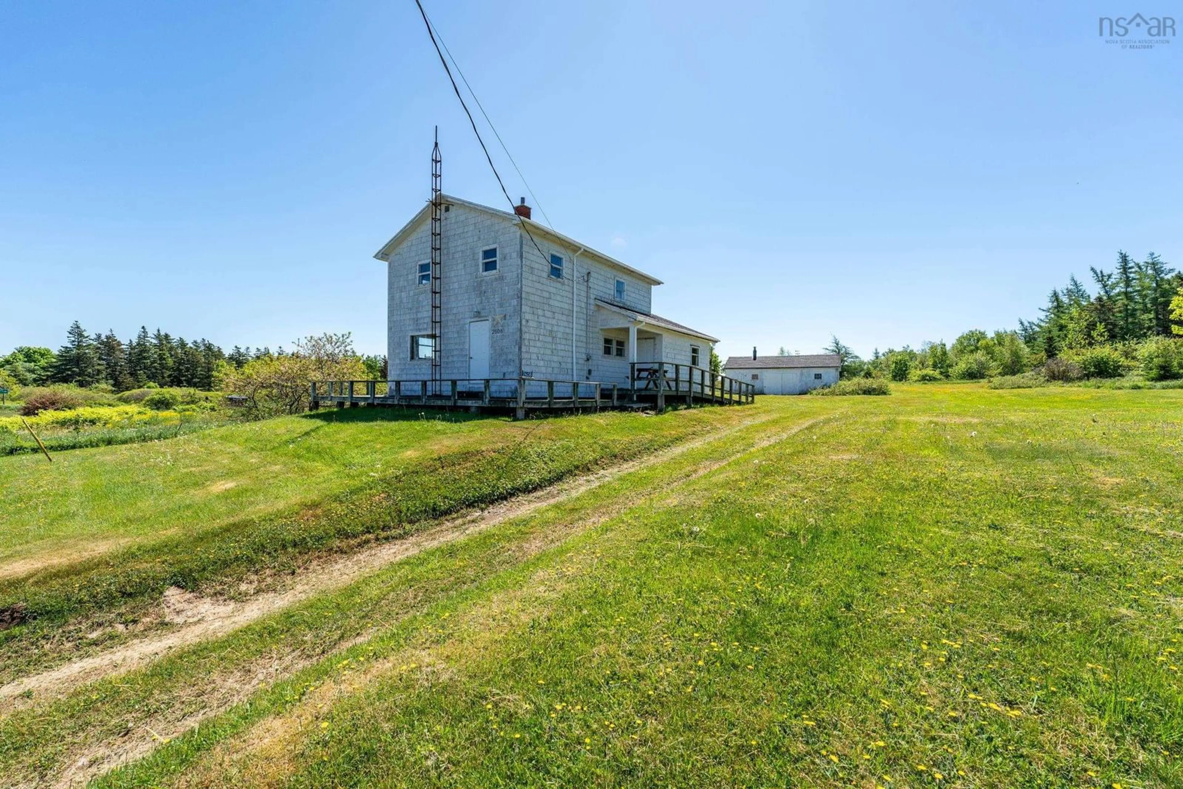 A pic from outside/outdoor area/front of a property/back of a property/a pic from drone, building for 2608 Highway 1, Grosses Coques Nova Scotia B0W 1M0