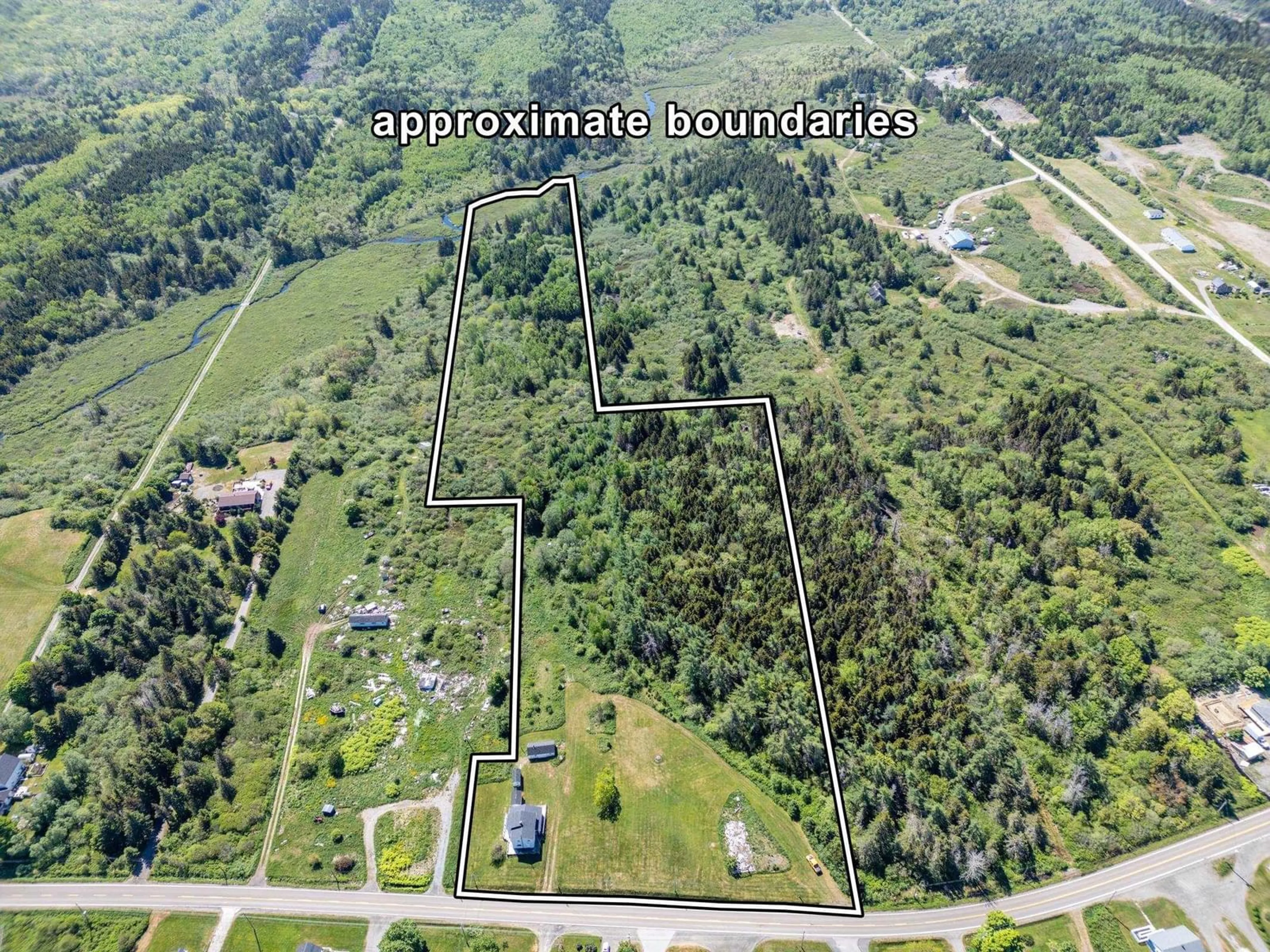 A pic from outside/outdoor area/front of a property/back of a property/a pic from drone, unknown for 2608 Highway 1, Grosses Coques Nova Scotia B0W 1M0