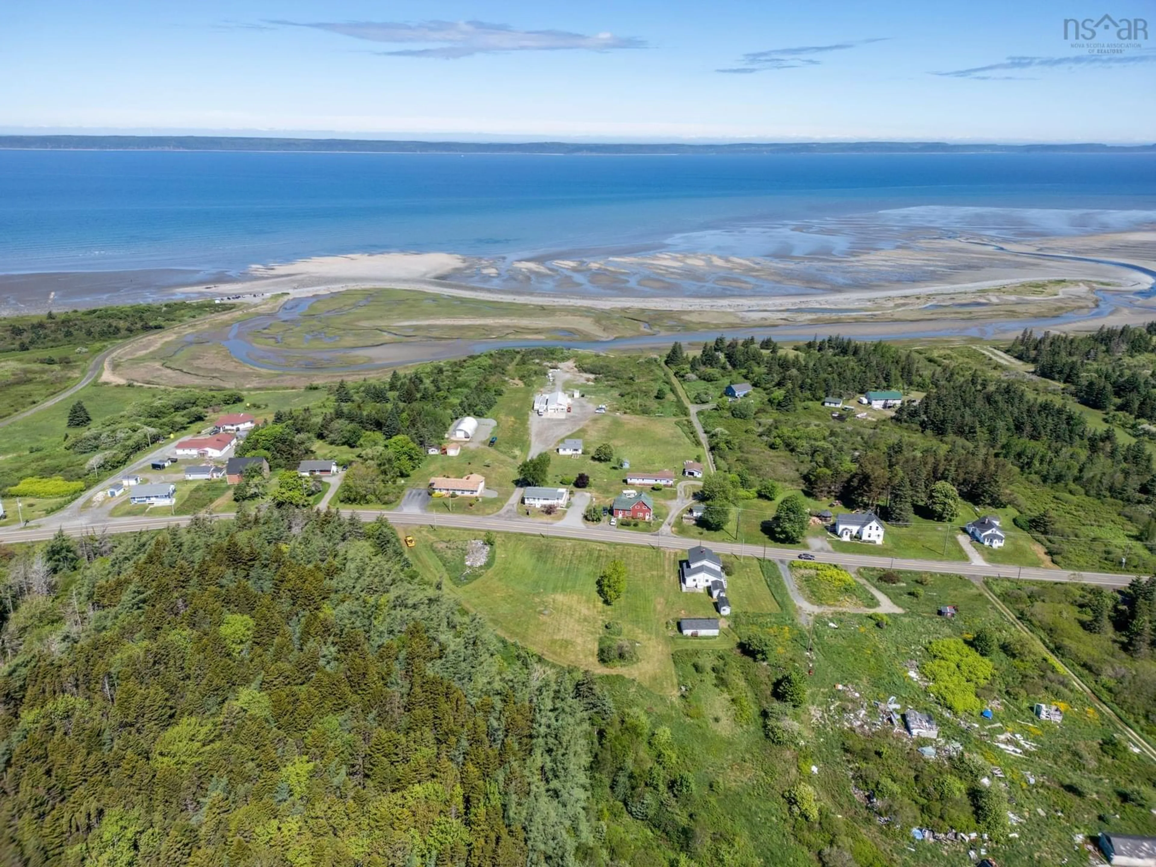 A pic from outside/outdoor area/front of a property/back of a property/a pic from drone, water/lake/river/ocean view for 2608 Highway 1, Grosses Coques Nova Scotia B0W 1M0