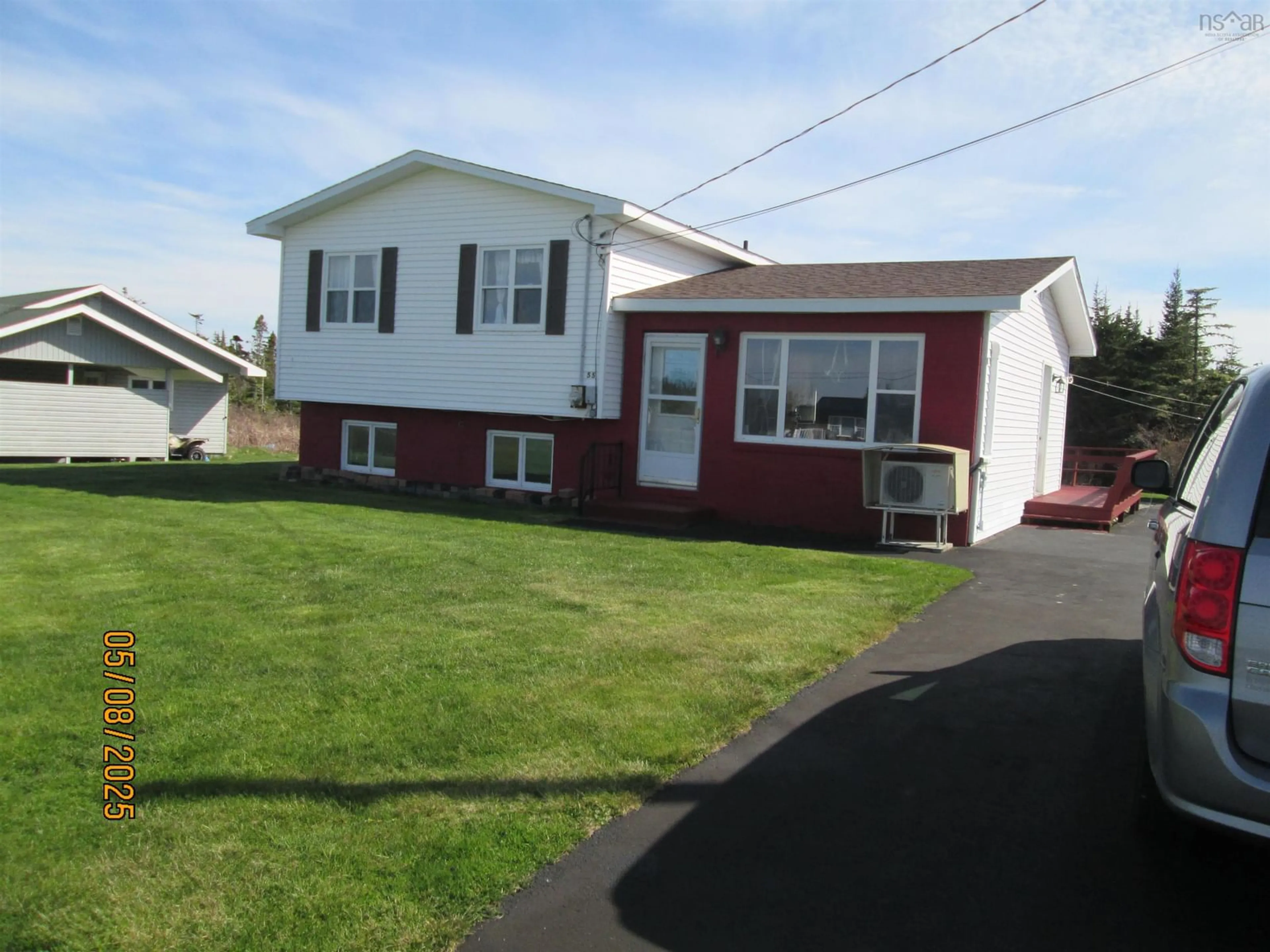 Home with vinyl exterior material, street for 55 Penney Road South Side, South Side Nova Scotia B0T 1W0