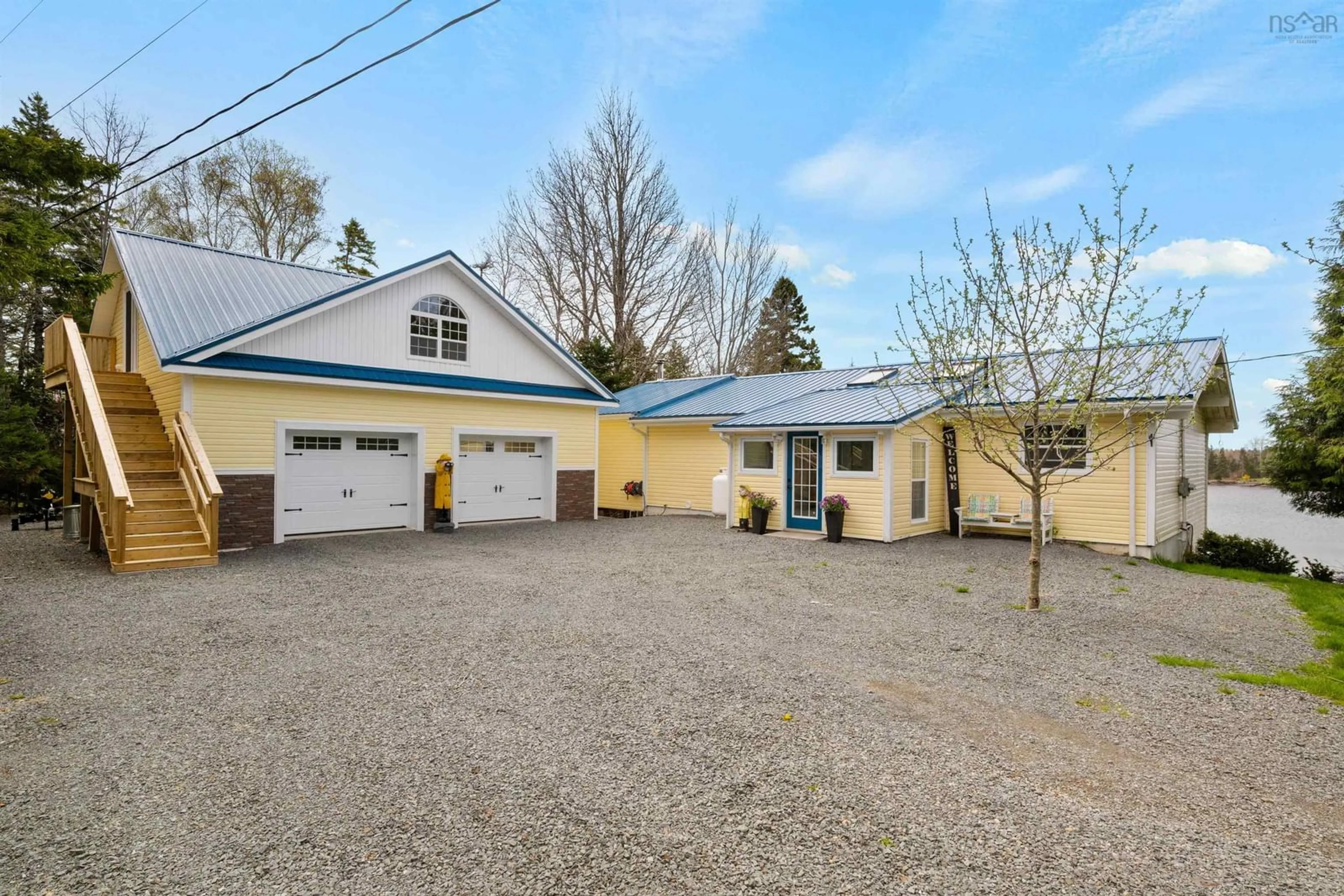 A pic from outside/outdoor area/front of a property/back of a property/a pic from drone, street for 42 Goldfinch Lane, Heckmans Island Nova Scotia B0J 2C0