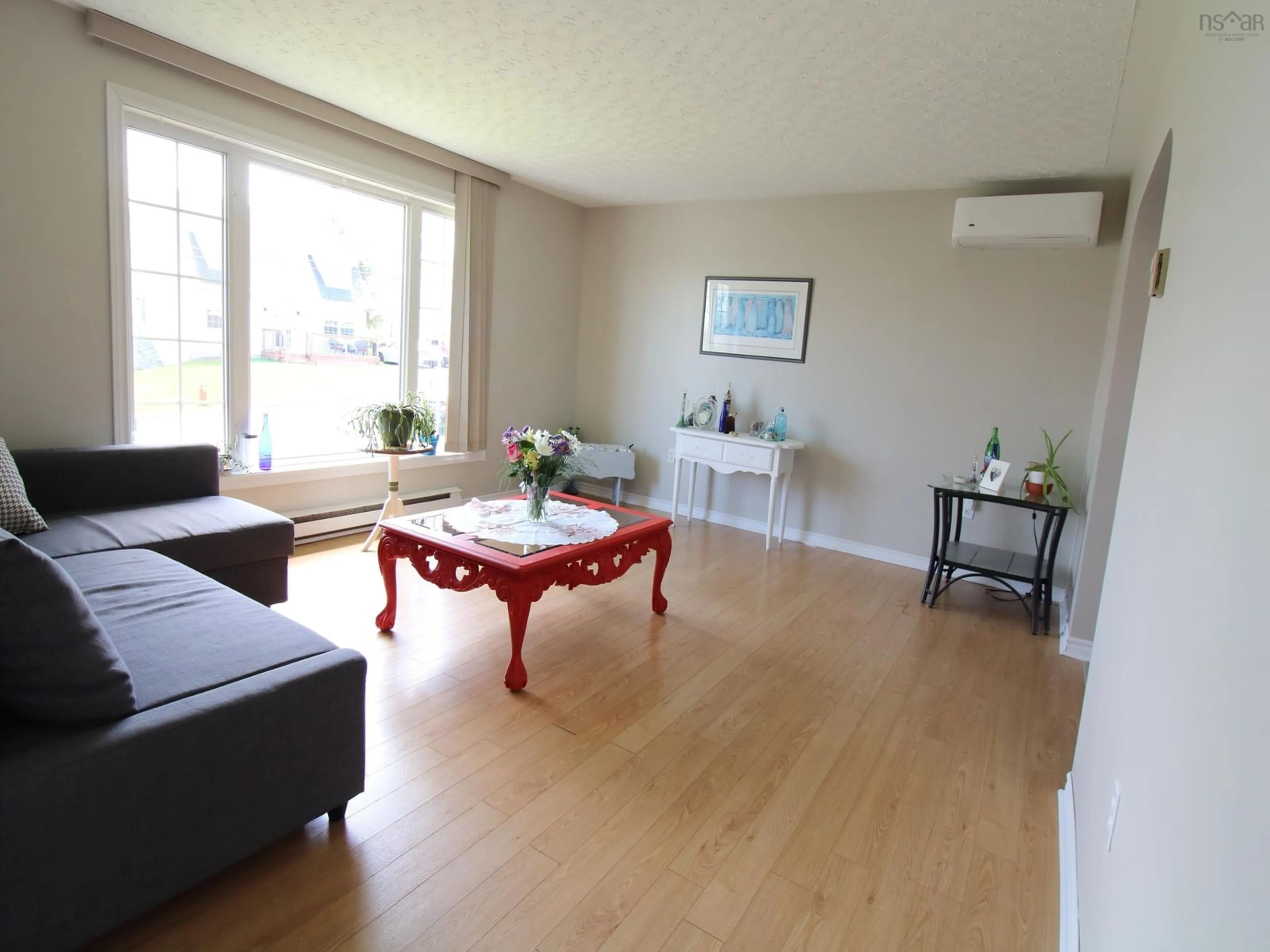 Living room with furniture, wood/laminate floor for 99 Lapierre Cres, Dartmouth Nova Scotia B2W 5C9