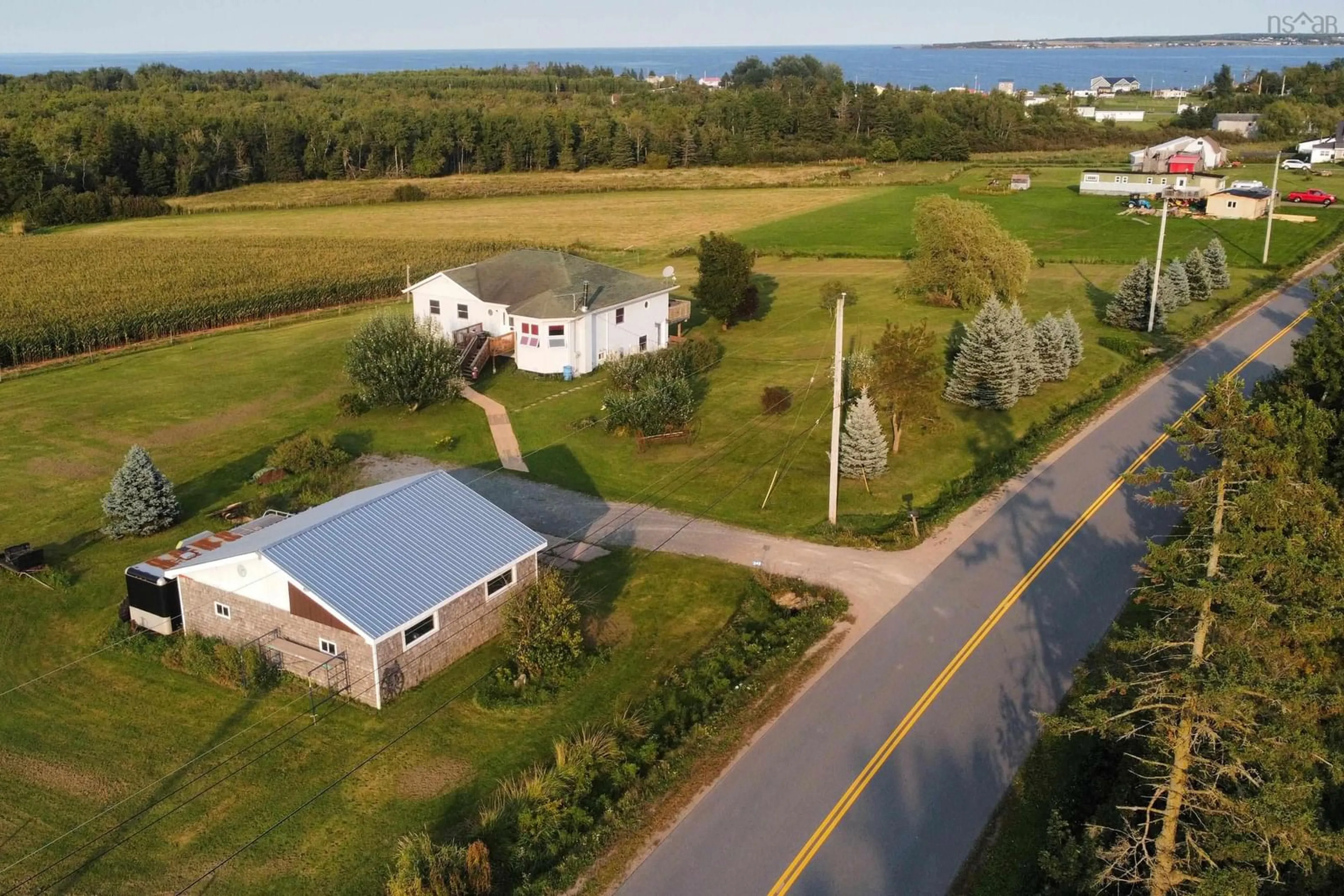 A pic from outside/outdoor area/front of a property/back of a property/a pic from drone, water/lake/river/ocean view for 345 Toney Bay Rd, Port Howe Nova Scotia B0K 1K0