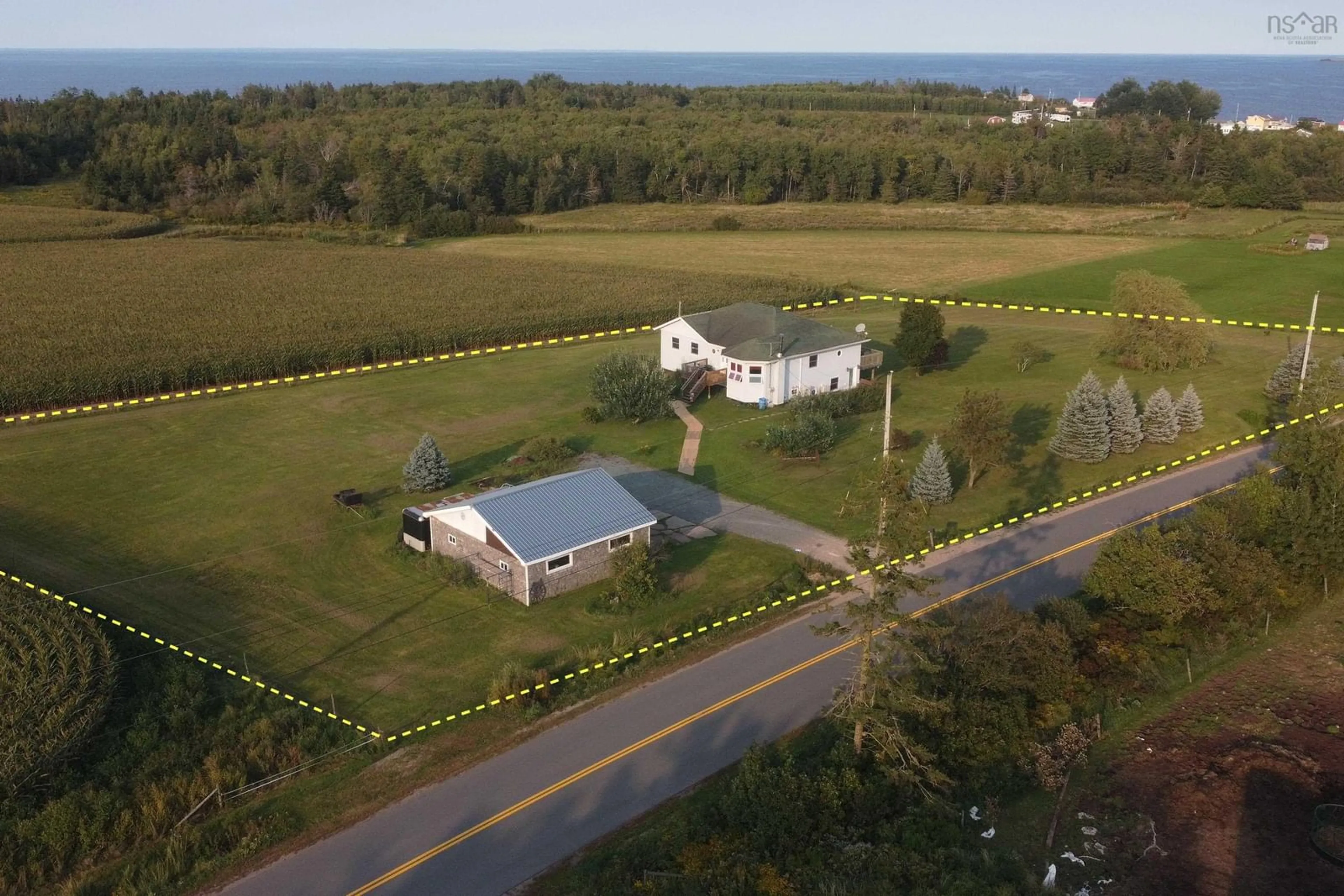 A pic from outside/outdoor area/front of a property/back of a property/a pic from drone, water/lake/river/ocean view for 345 Toney Bay Rd, Port Howe Nova Scotia B0K 1K0