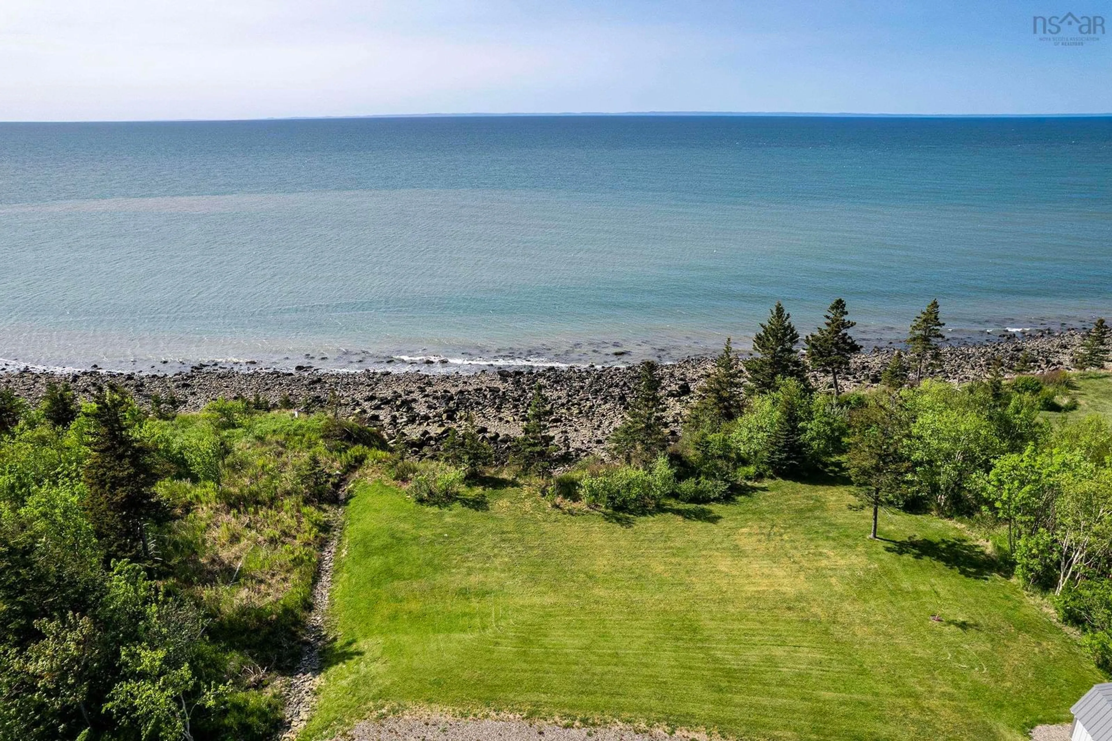 A pic from outside/outdoor area/front of a property/back of a property/a pic from drone, water/lake/river/ocean view for 11641 Shore Rd, Mount Hanley Nova Scotia B0S 1P0