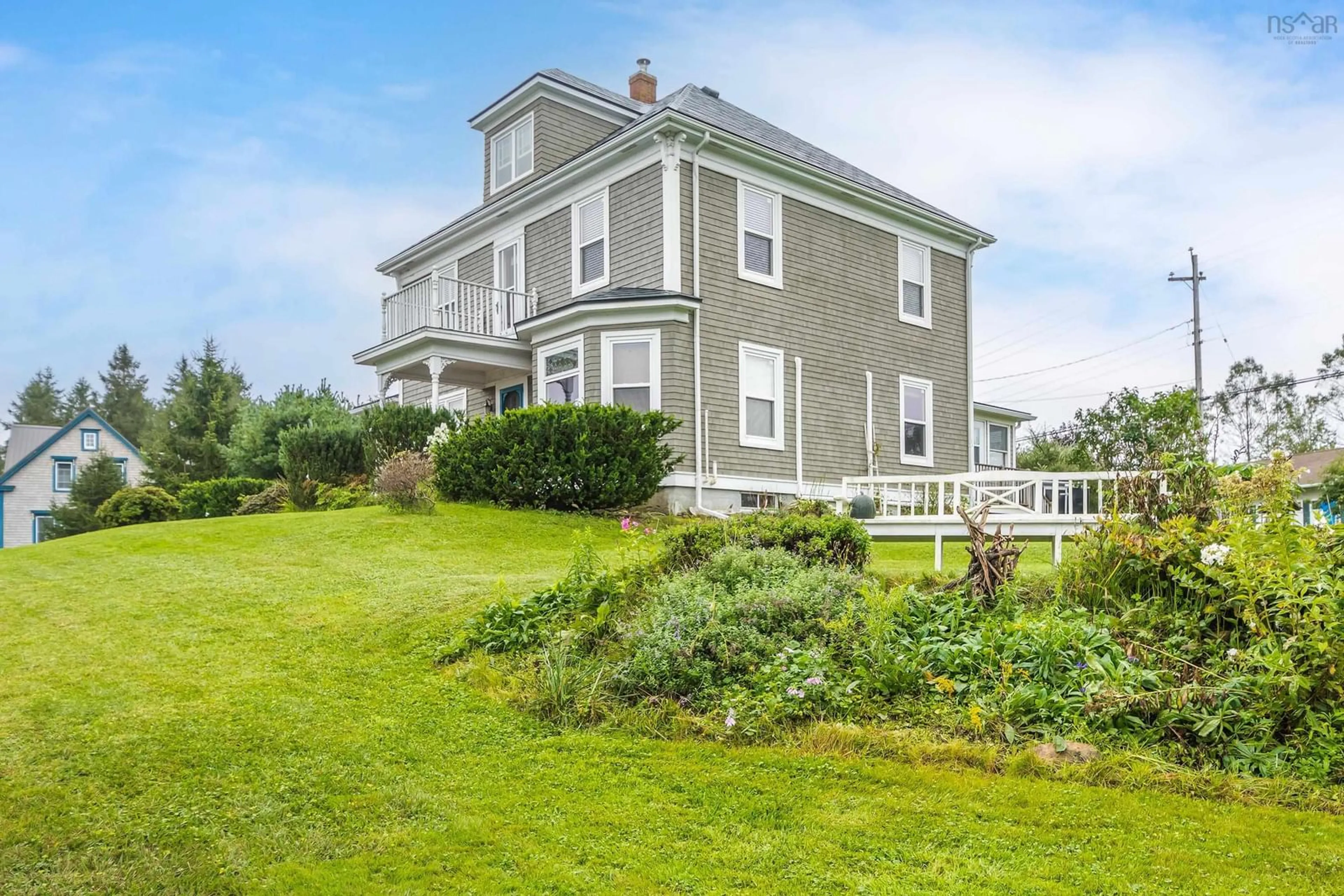 A pic from outside/outdoor area/front of a property/back of a property/a pic from drone, water/lake/river/ocean view for 1640 Highway 332, First South Nova Scotia B0J 2C0