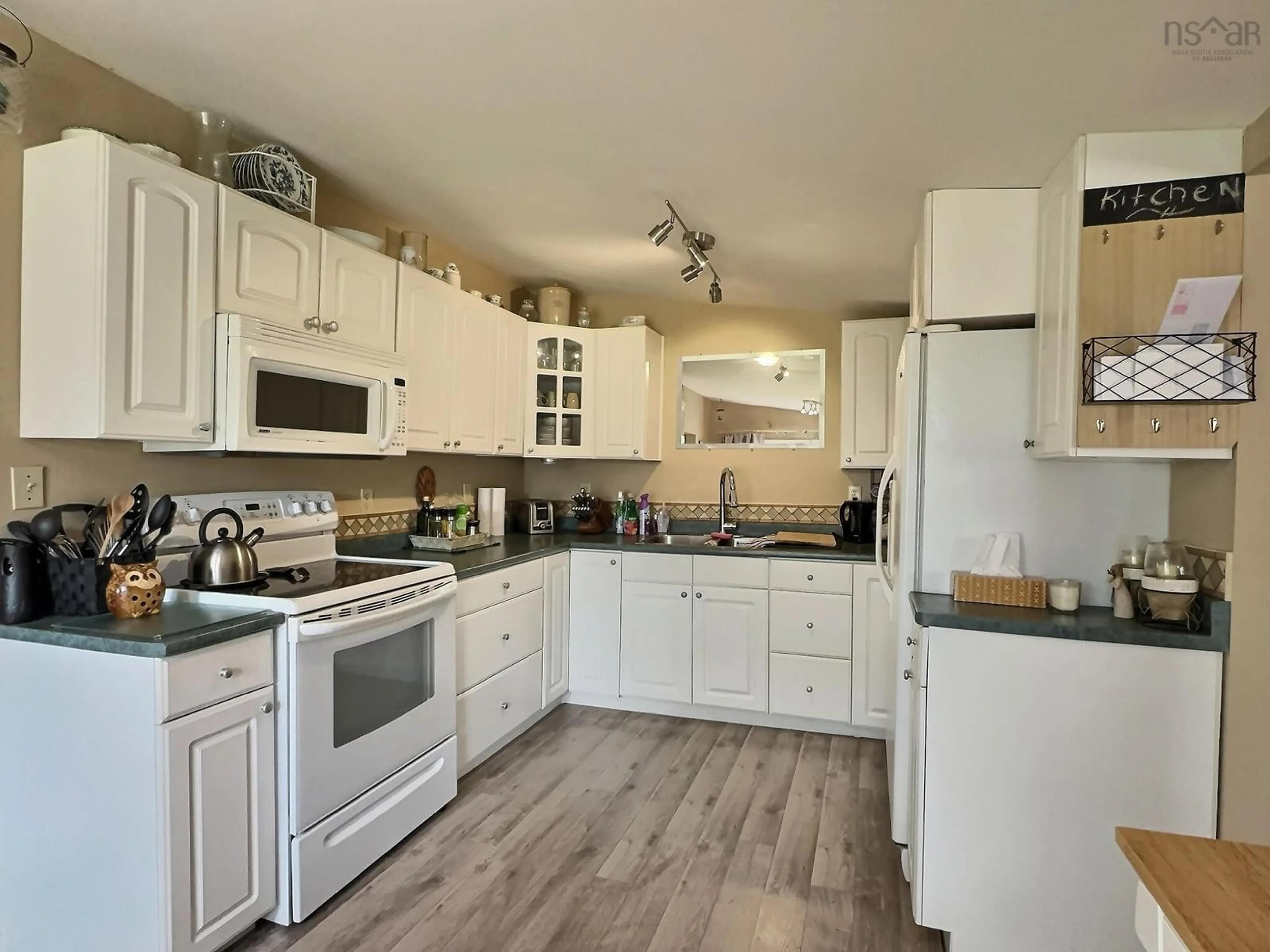 Open concept kitchen, unknown for 31 Clinton St, Amherst Nova Scotia B4H 1K2