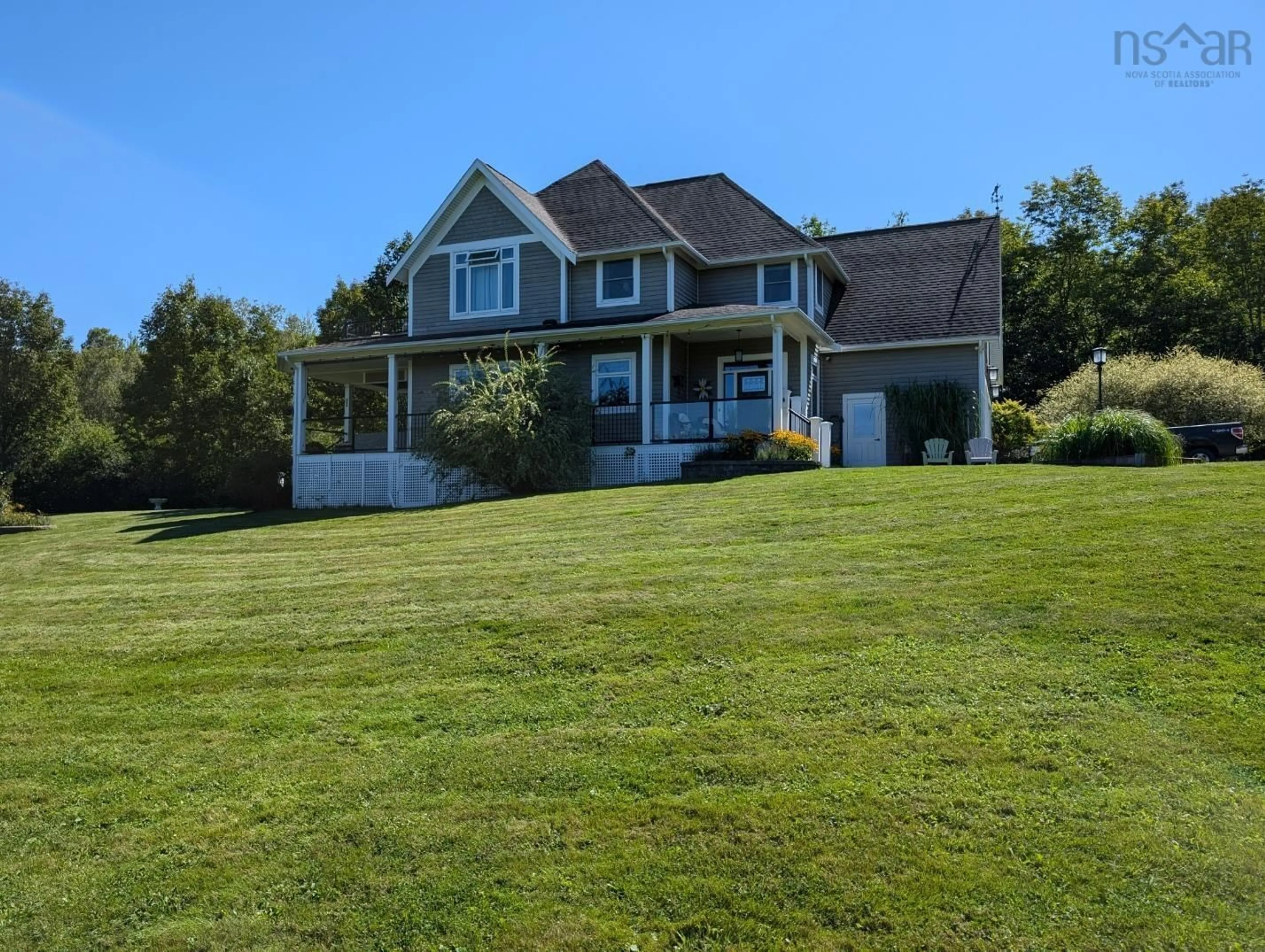 A pic from outside/outdoor area/front of a property/back of a property/a pic from drone, water/lake/river/ocean view for 31 Aberdeen Beach Road, Mount Denson Nova Scotia B0P 1P0