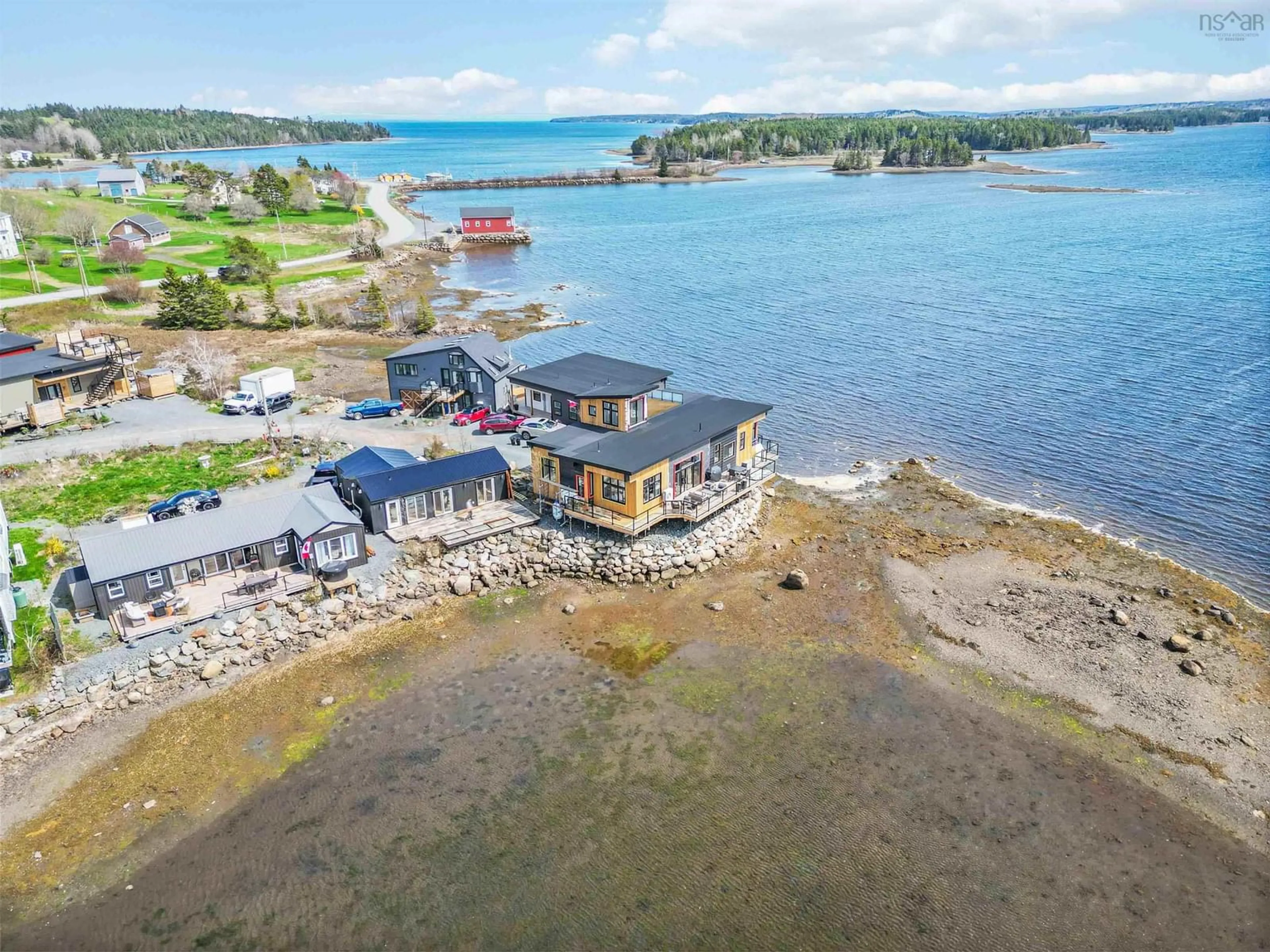 A pic from outside/outdoor area/front of a property/back of a property/a pic from drone, water/lake/river/ocean view for 693 Masons Beach Rd #5, First South Nova Scotia B0J 2C0