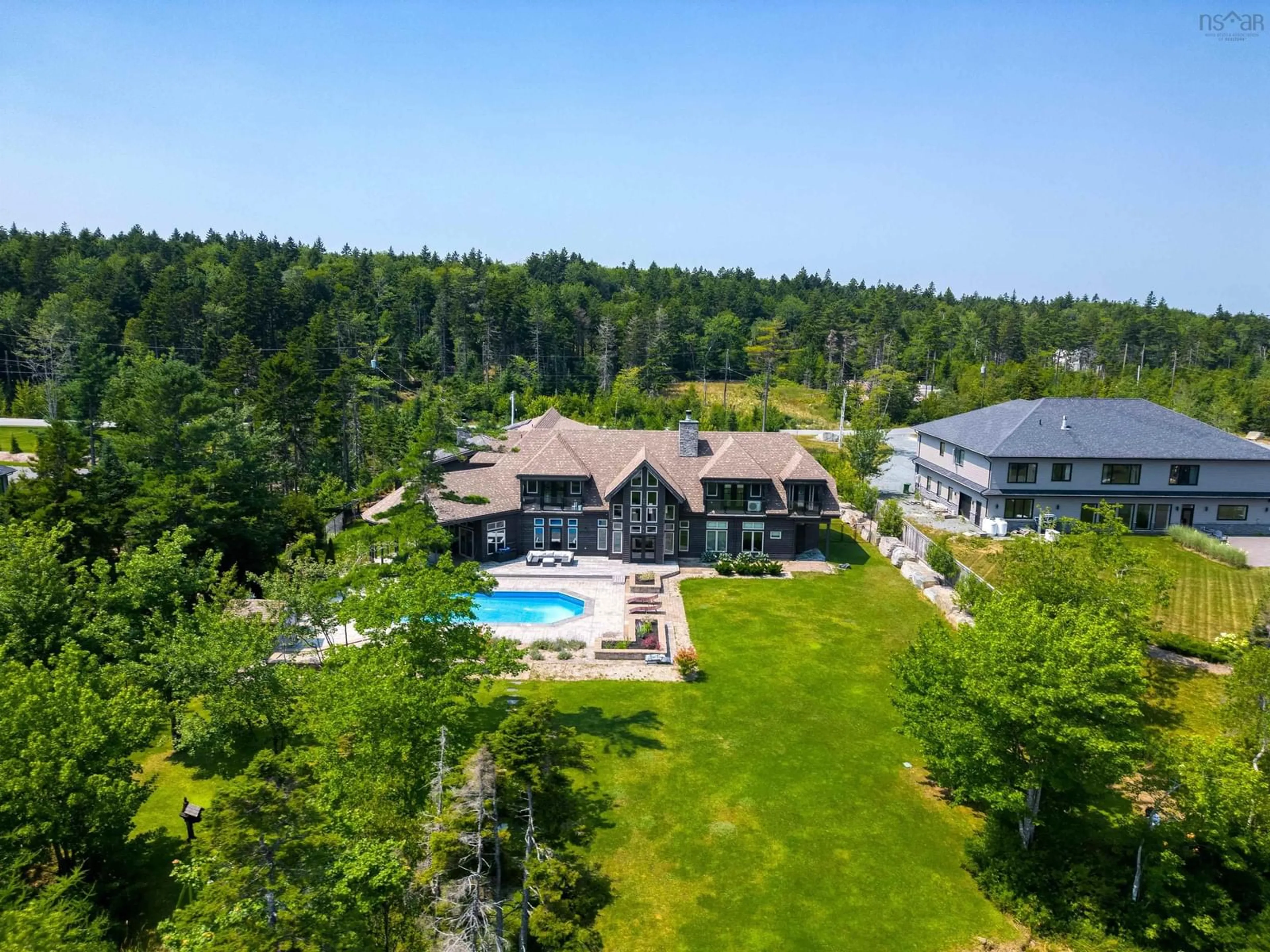 A pic from outside/outdoor area/front of a property/back of a property/a pic from drone, water/lake/river/ocean view for 402 Lochmoor Lane, Lake Loon Nova Scotia B2W 6C8