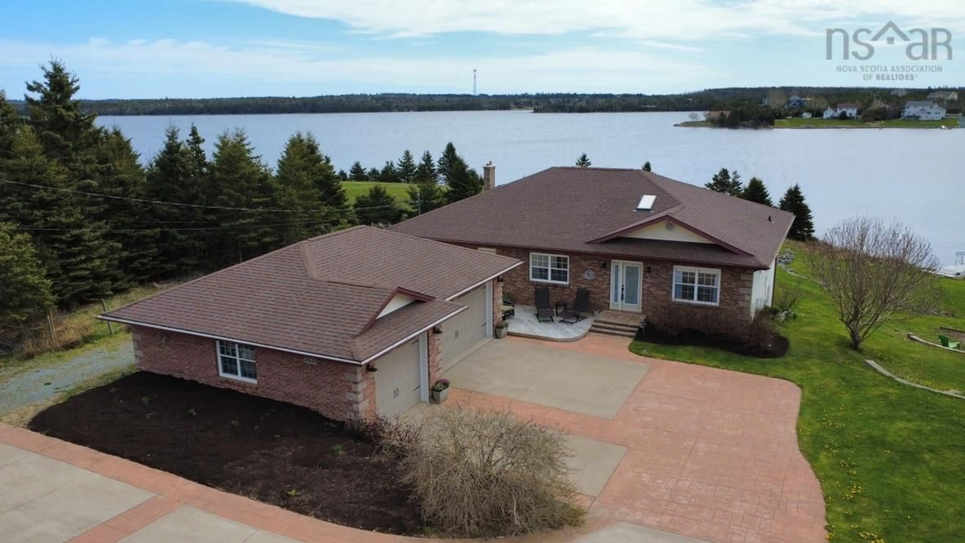 A pic from outside/outdoor area/front of a property/back of a property/a pic from drone, water/lake/river/ocean view for 2426 Crowell Rd, East Lawrencetown Nova Scotia B2Z 1P3