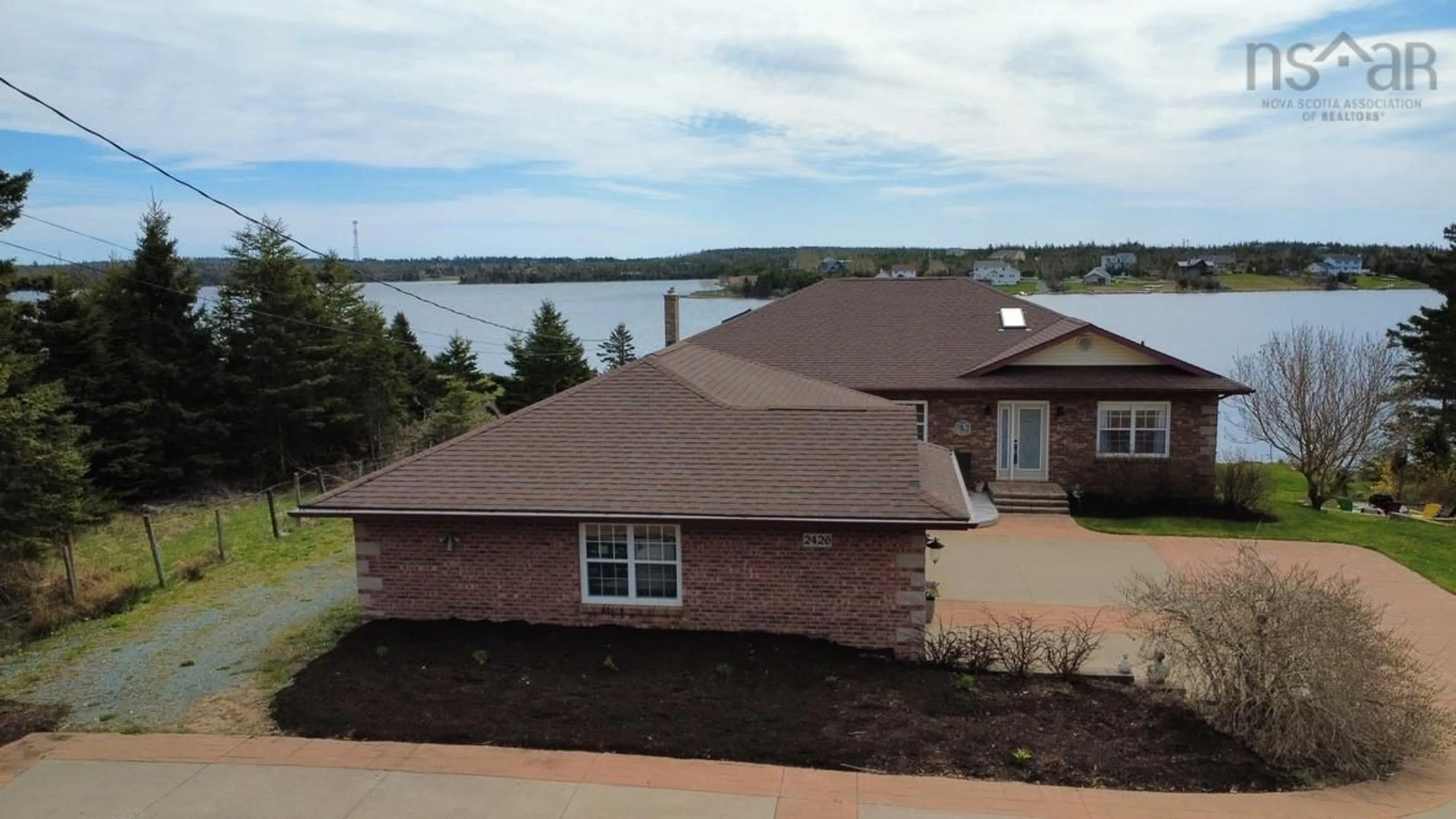 A pic from outside/outdoor area/front of a property/back of a property/a pic from drone, water/lake/river/ocean view for 2426 Crowell Rd, East Lawrencetown Nova Scotia B2Z 1P3