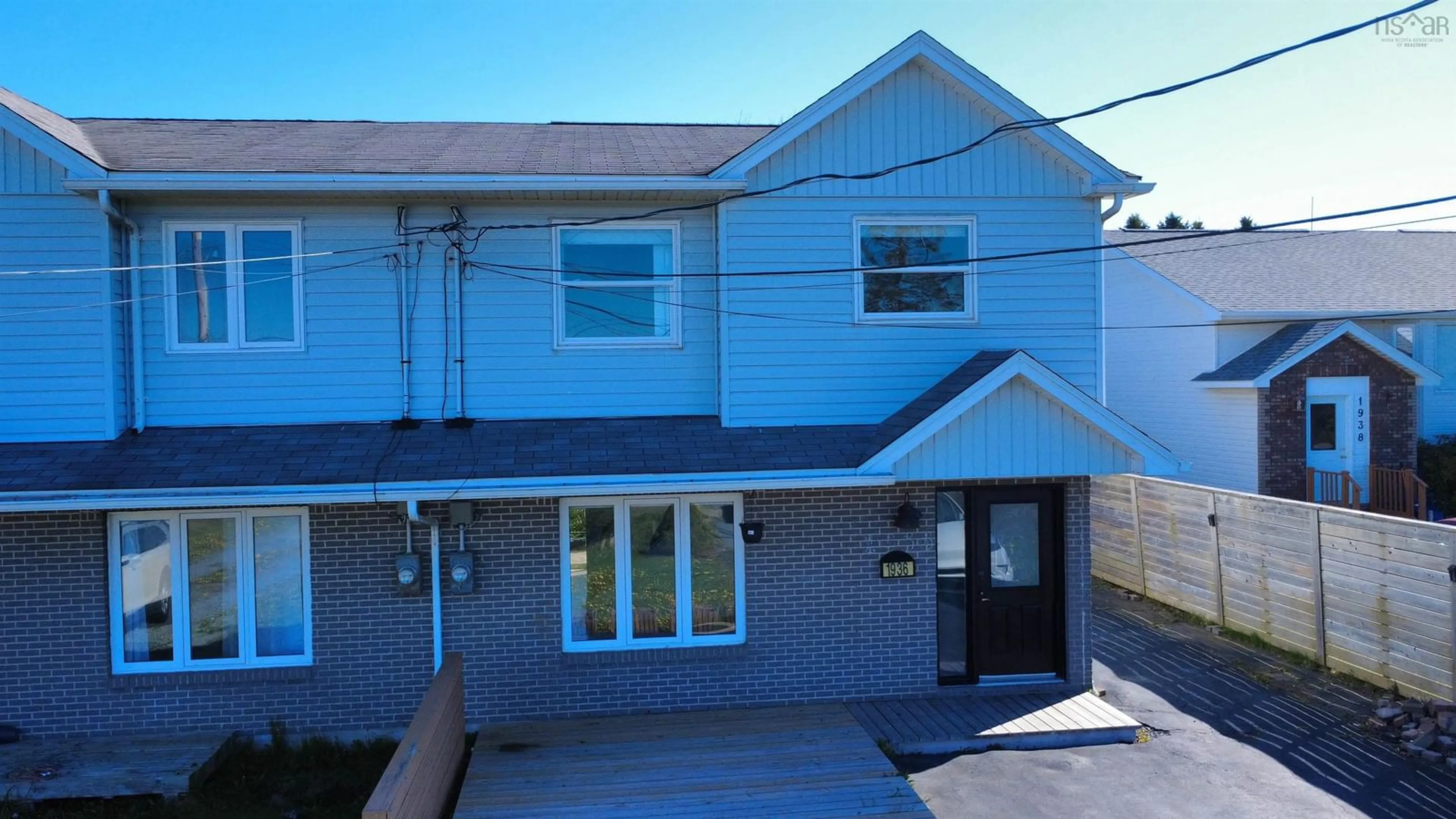 A pic from outside/outdoor area/front of a property/back of a property/a pic from drone, street for 1936 Shore Rd, Eastern Passage Nova Scotia B3G 1G8