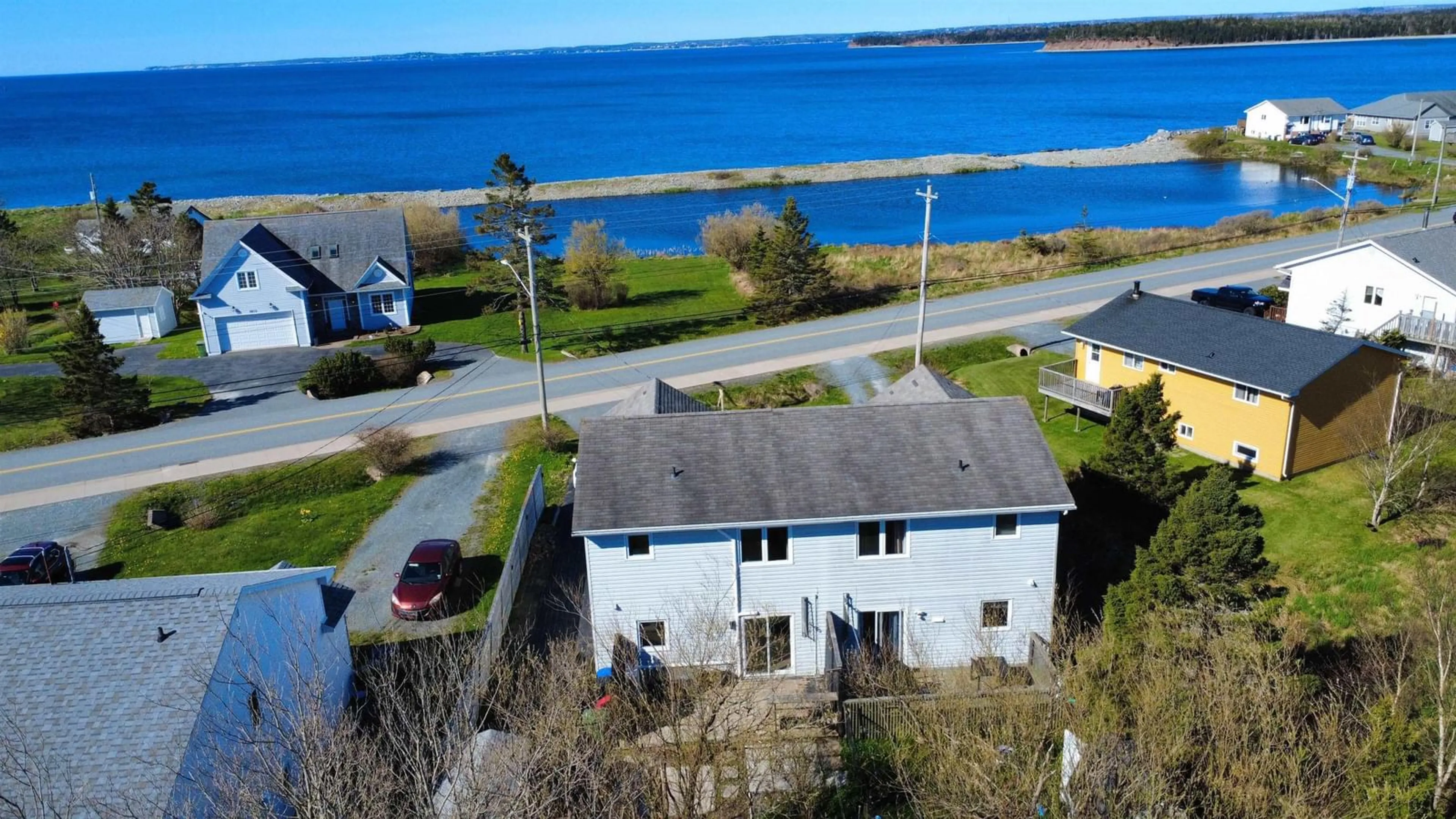 A pic from outside/outdoor area/front of a property/back of a property/a pic from drone, water/lake/river/ocean view for 1936 Shore Rd, Eastern Passage Nova Scotia B3G 1G8