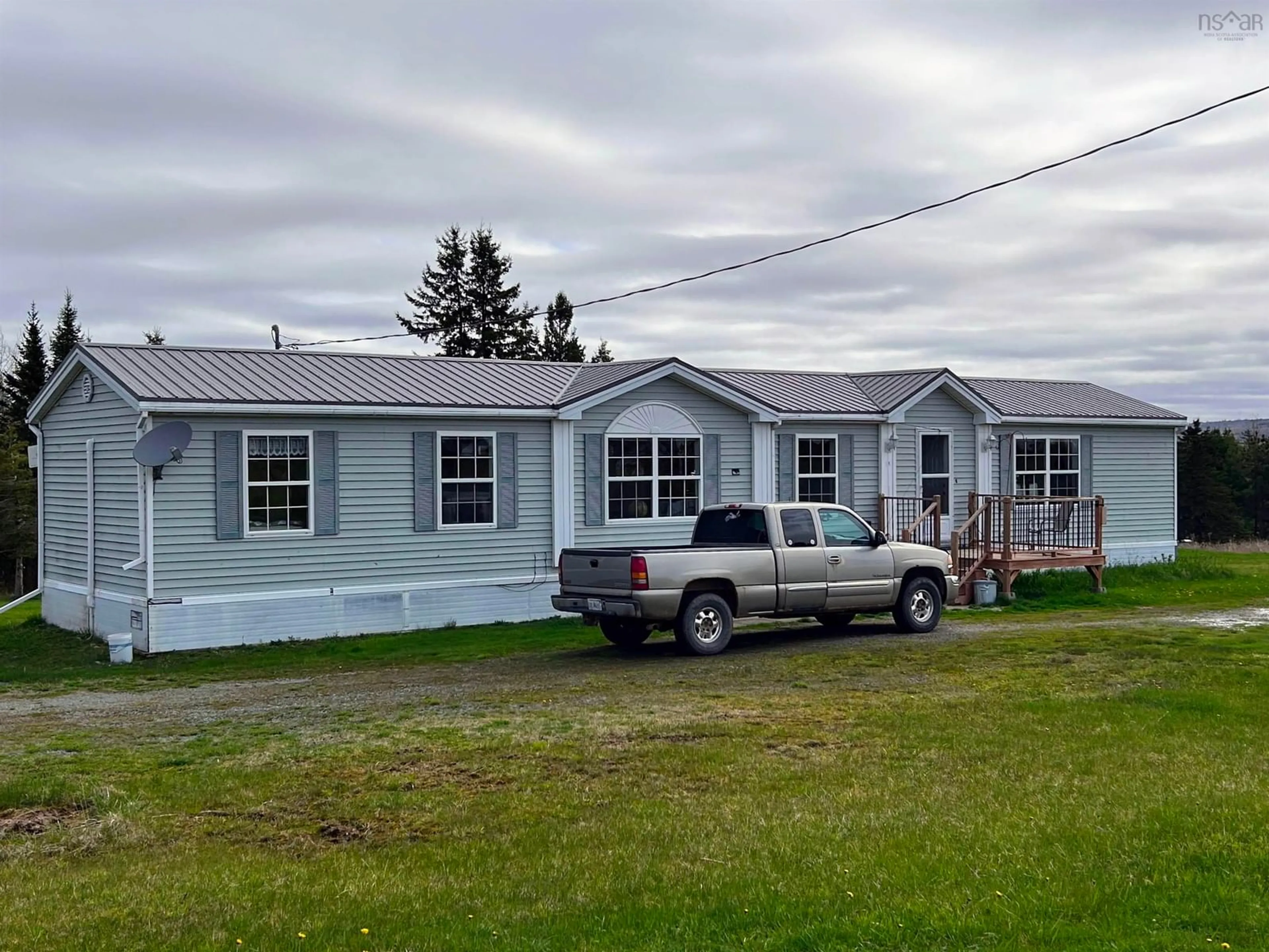 Home with vinyl exterior material, street for 402 Johnson Rd, Coldstream Nova Scotia B0N 2J0