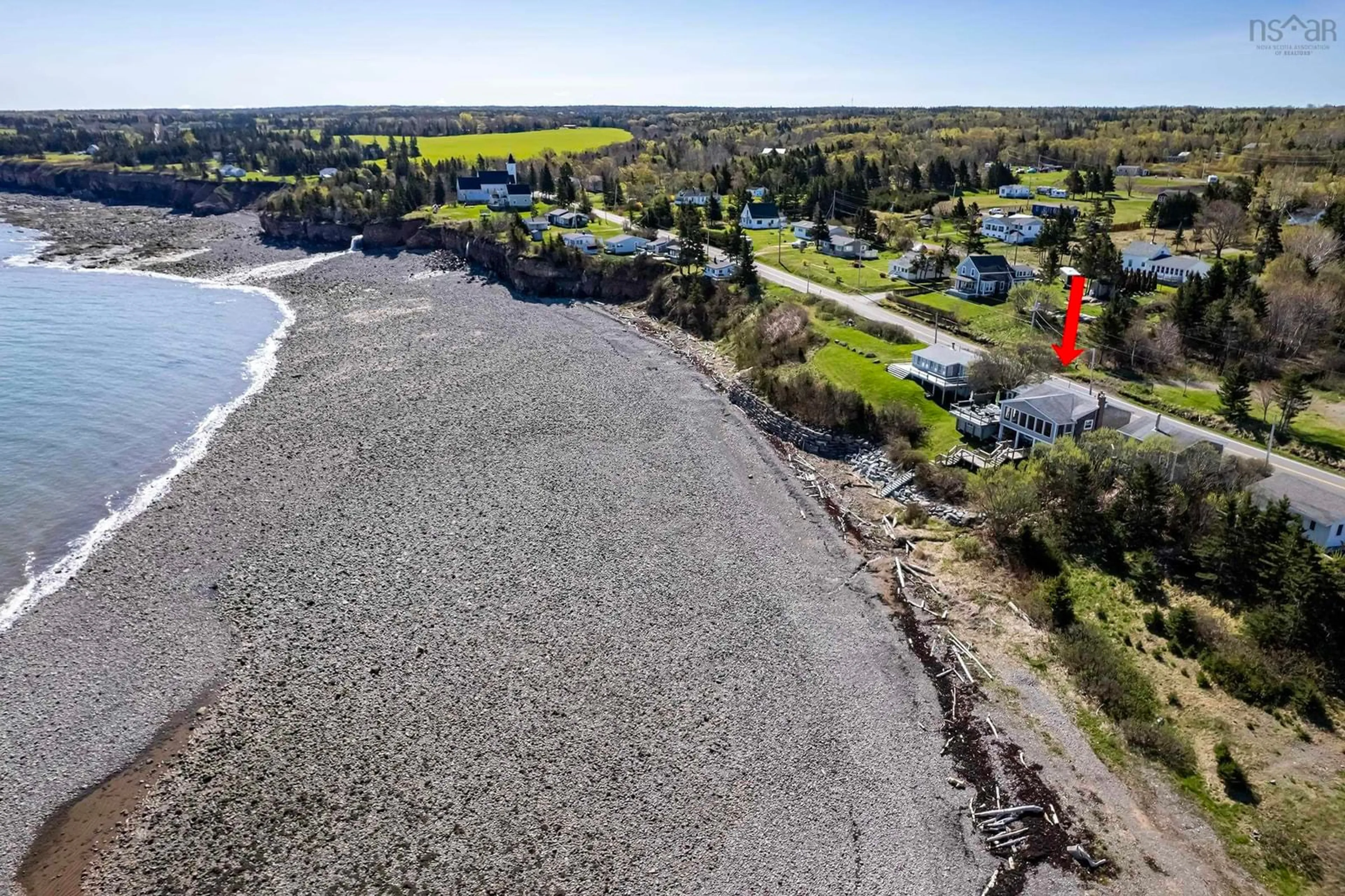 A pic from outside/outdoor area/front of a property/back of a property/a pic from drone, water/lake/river/ocean view for 37 Seaman St, Margaretsville Nova Scotia B0S 1N0