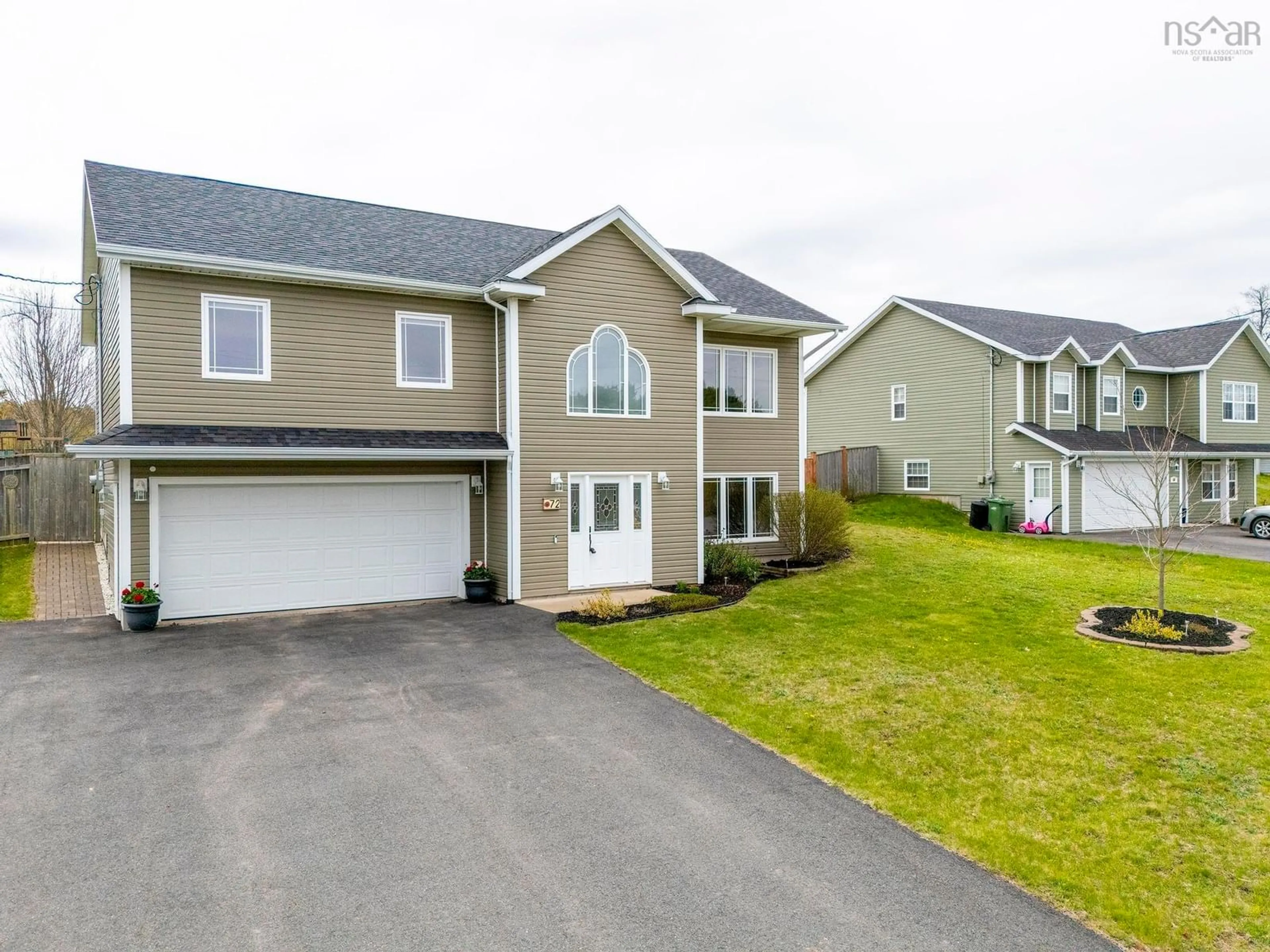 Home with vinyl exterior material, street for 72 Terra Nova Dr, Greenwood Nova Scotia B0P 1N0